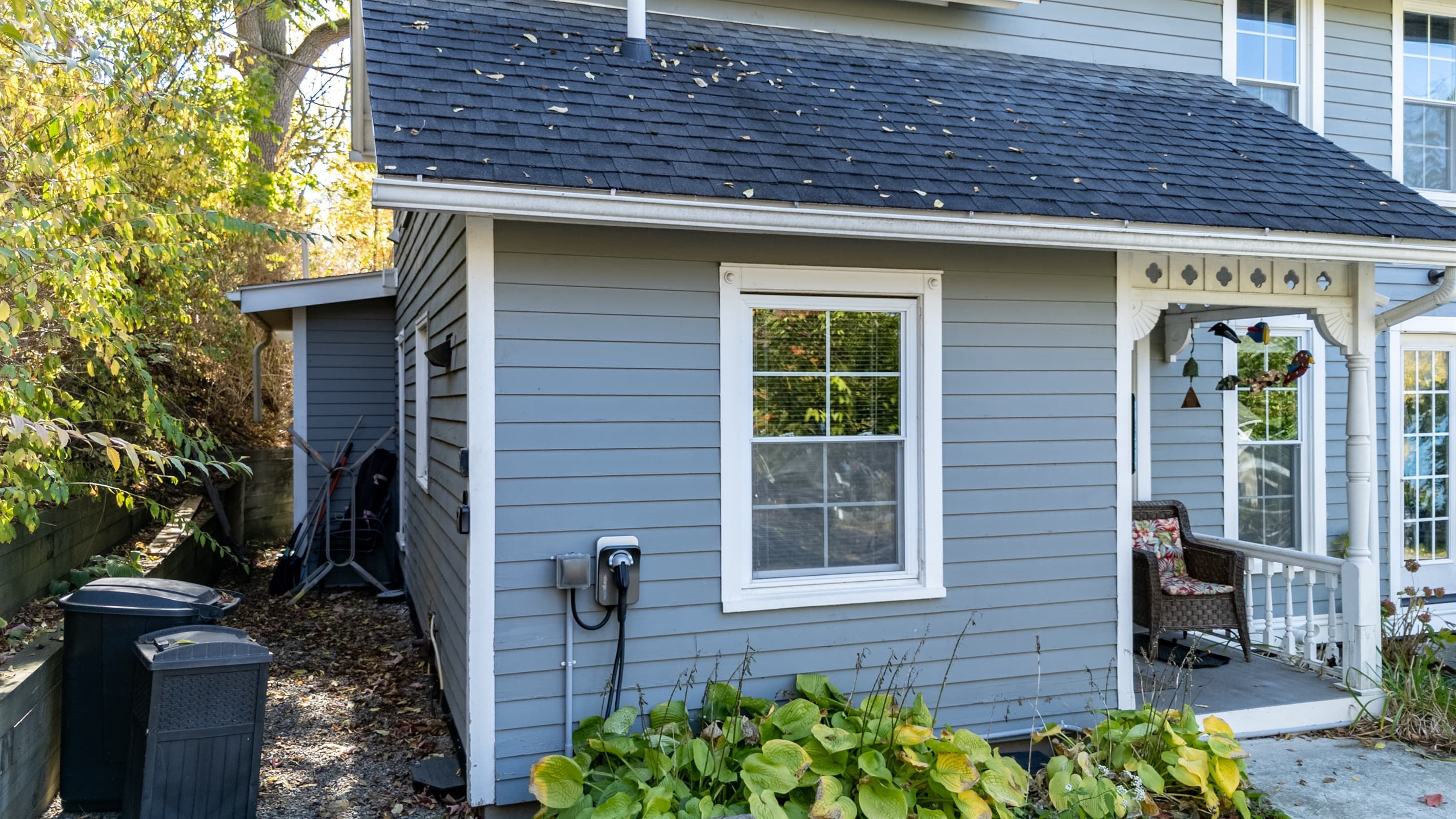 Electric vehicle charger beside the house
