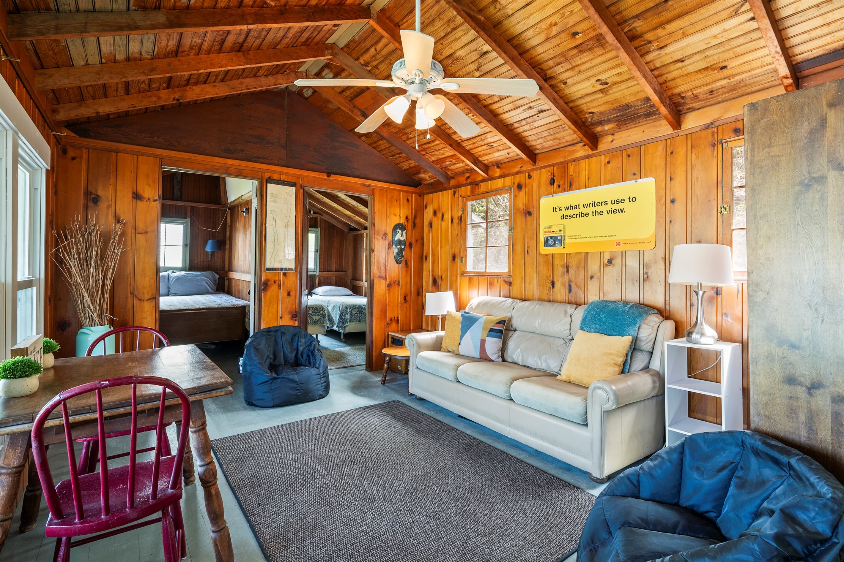 Wood-paneled living room with sectional