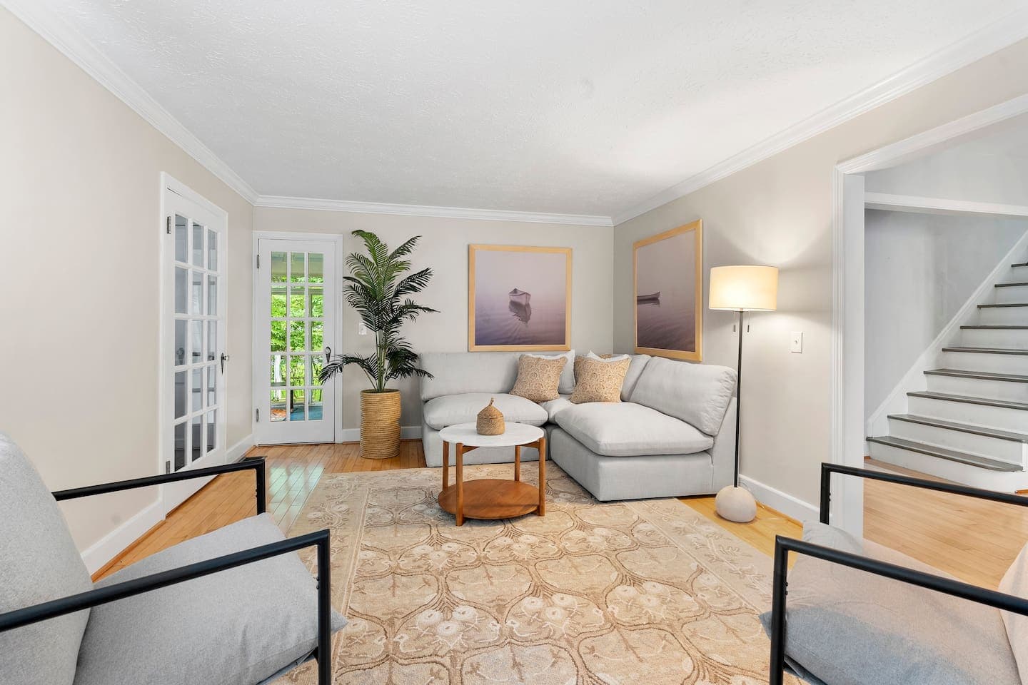 Living room with sofa and armchairs