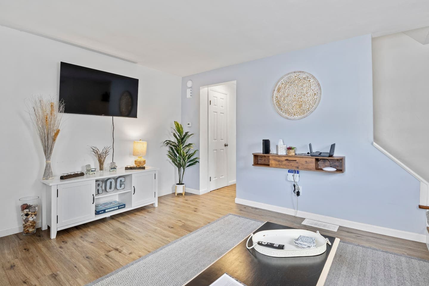 Living room with wall-mounted television