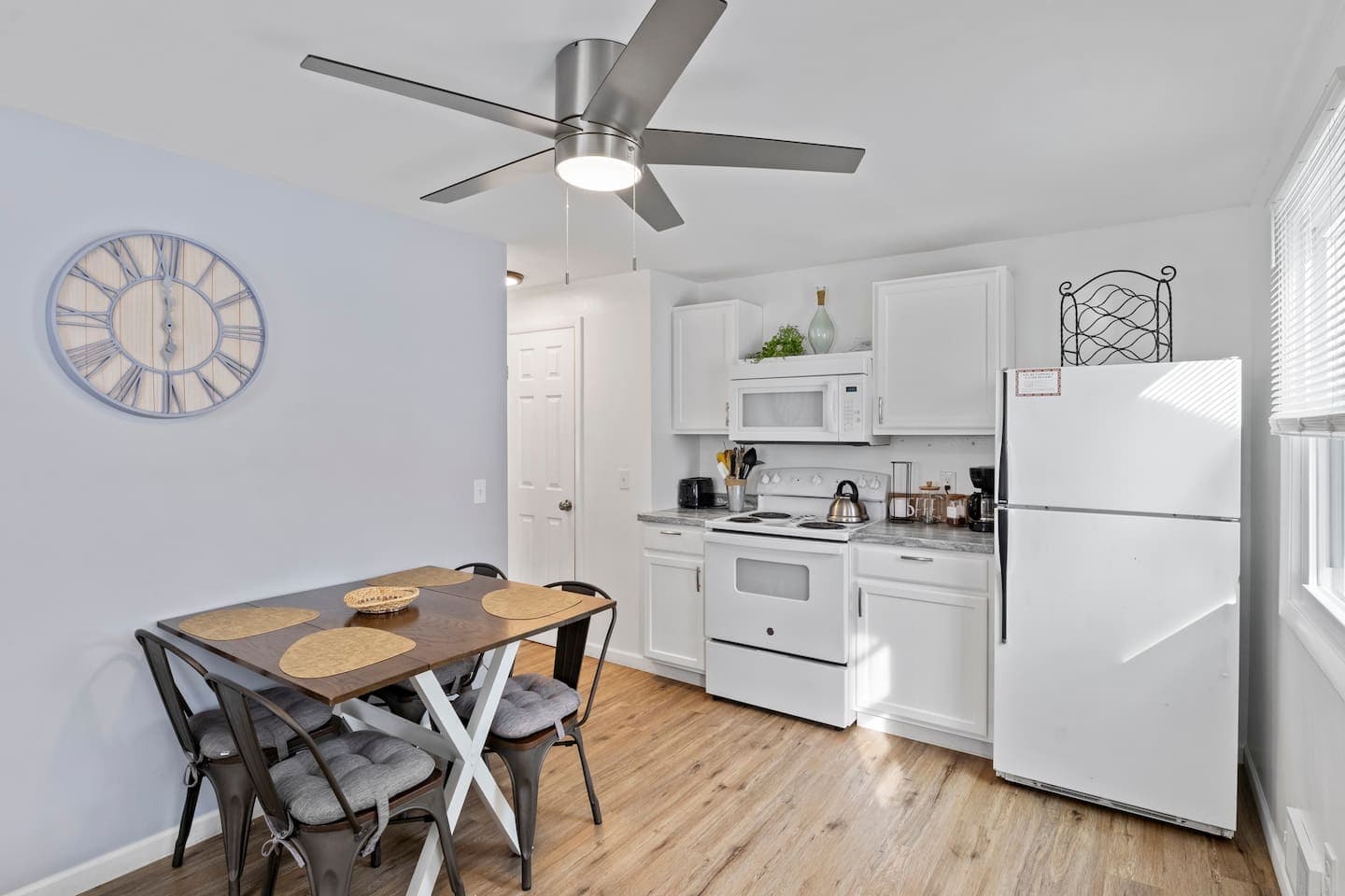 Dining area beneath a ceiling fan