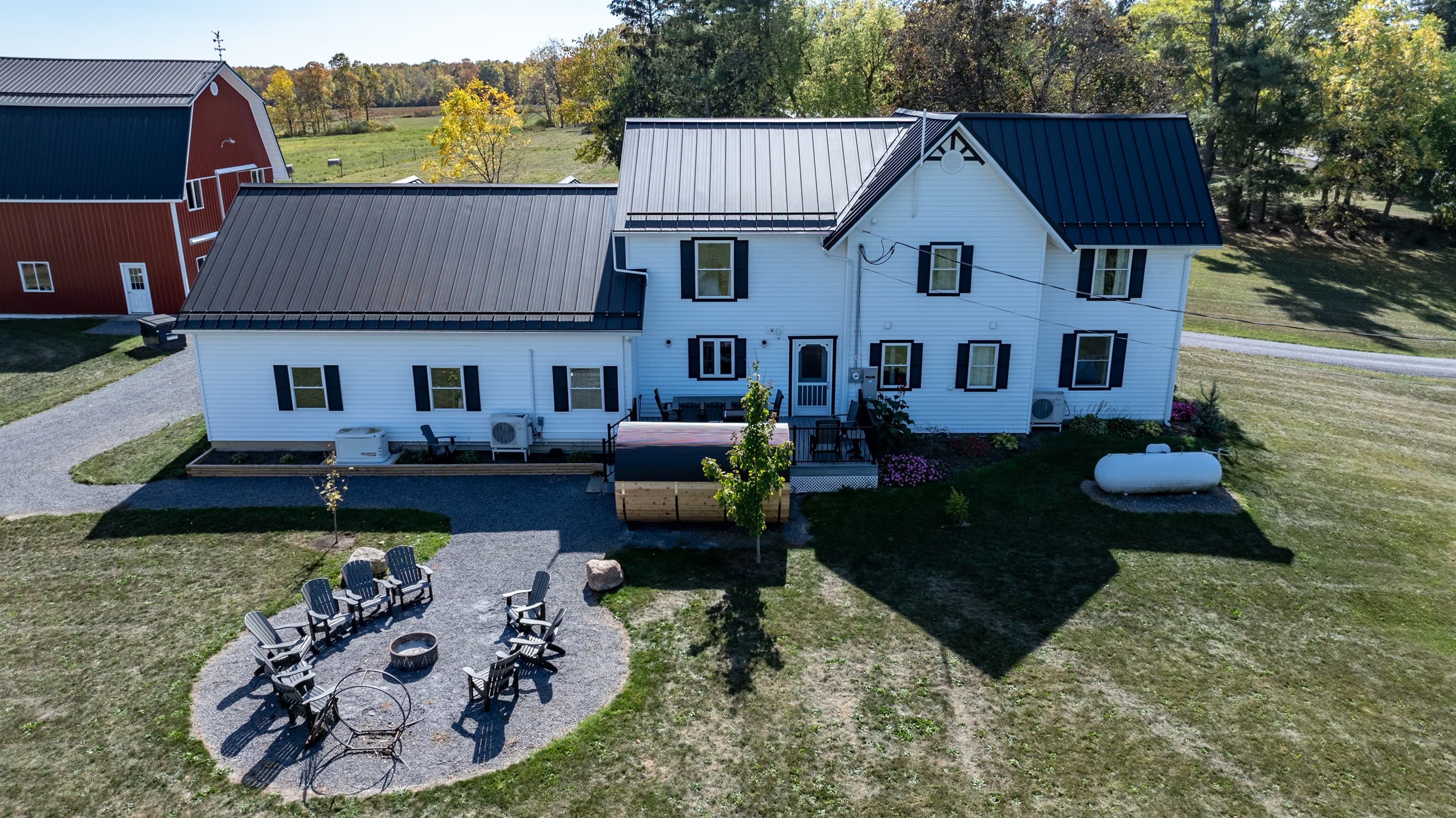 Aerial view of farmhouse and patio