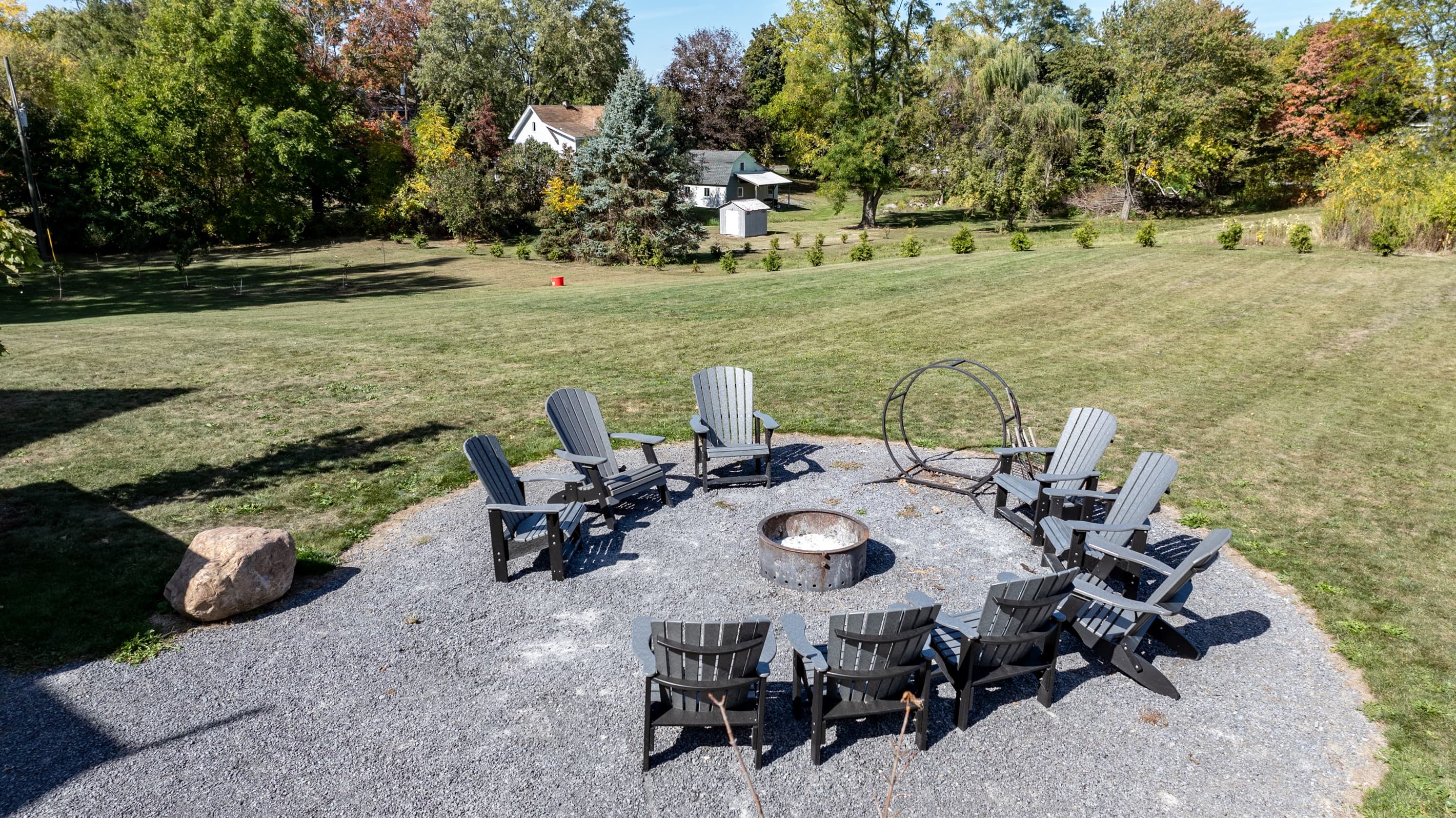Fire pit surrounded by outdoor chairs