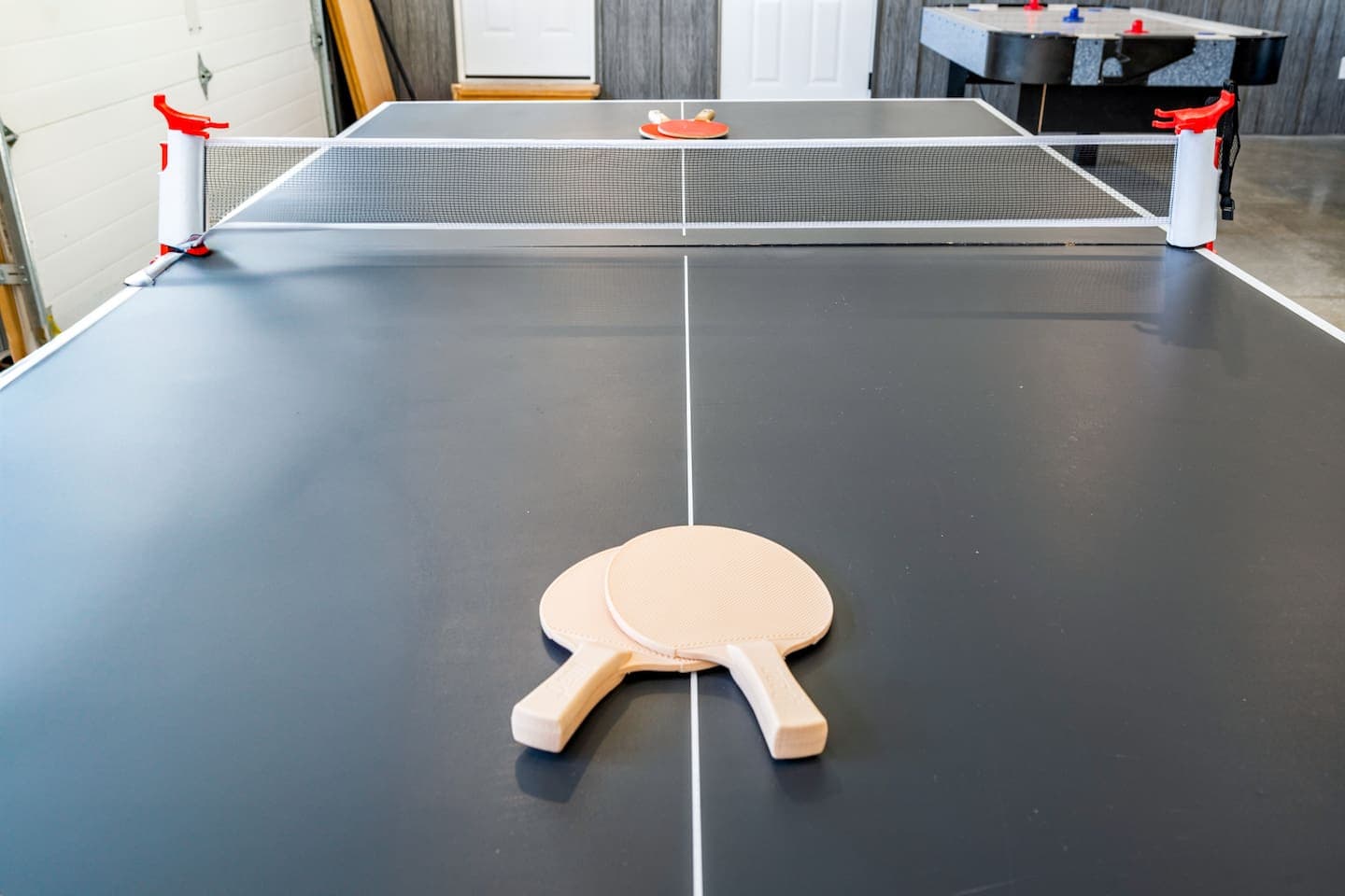 Ping-pong table within game area