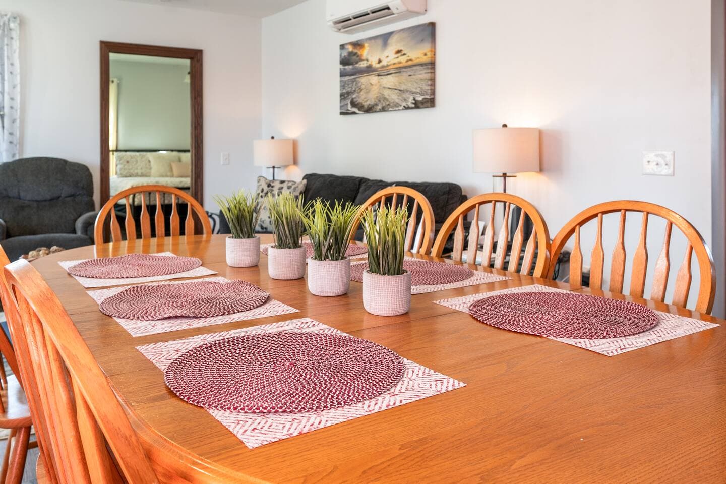Wooden dining table with eight chairs