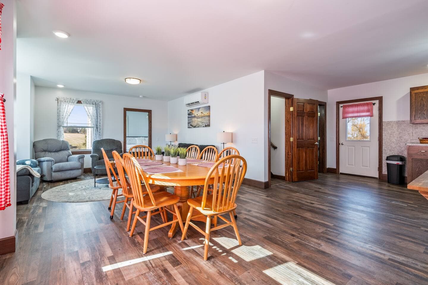 Dining table beside the open kitchen