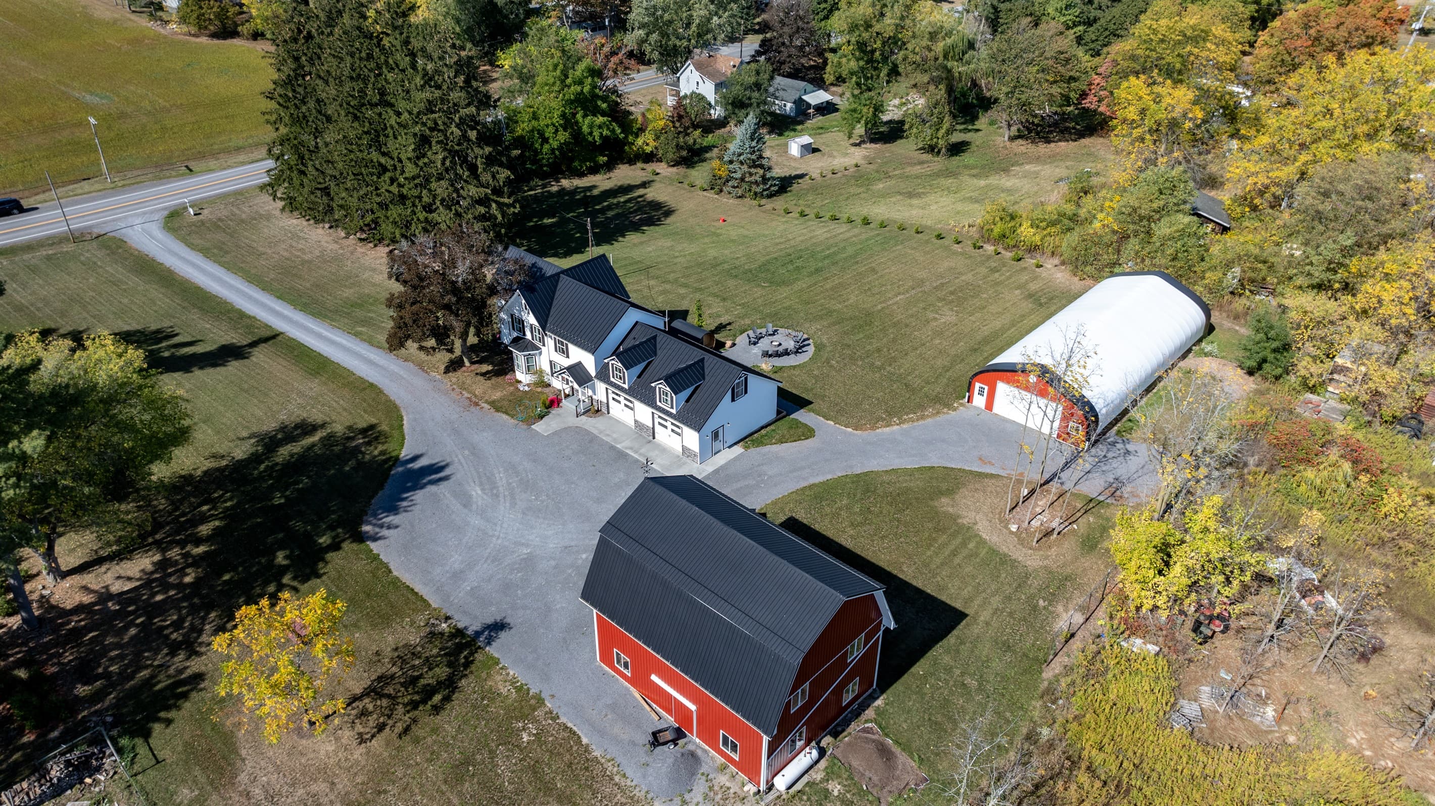 Property surrounded by open lawn and trees