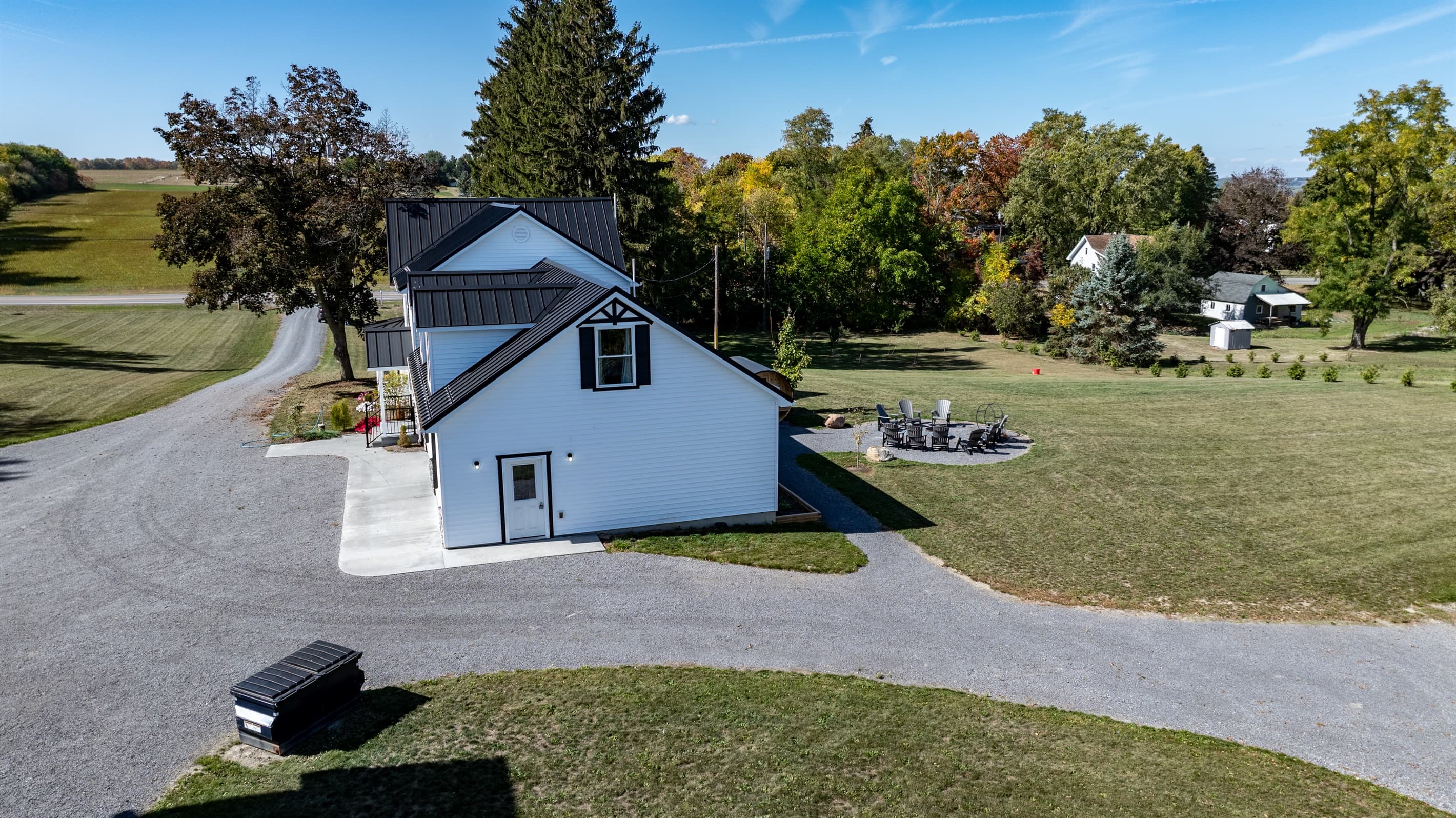Side exterior overlooking the open yard