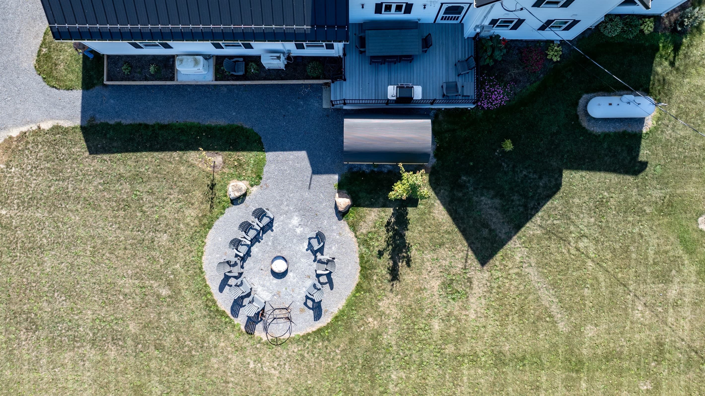 Aerial shot of the property with the outdoor firepit