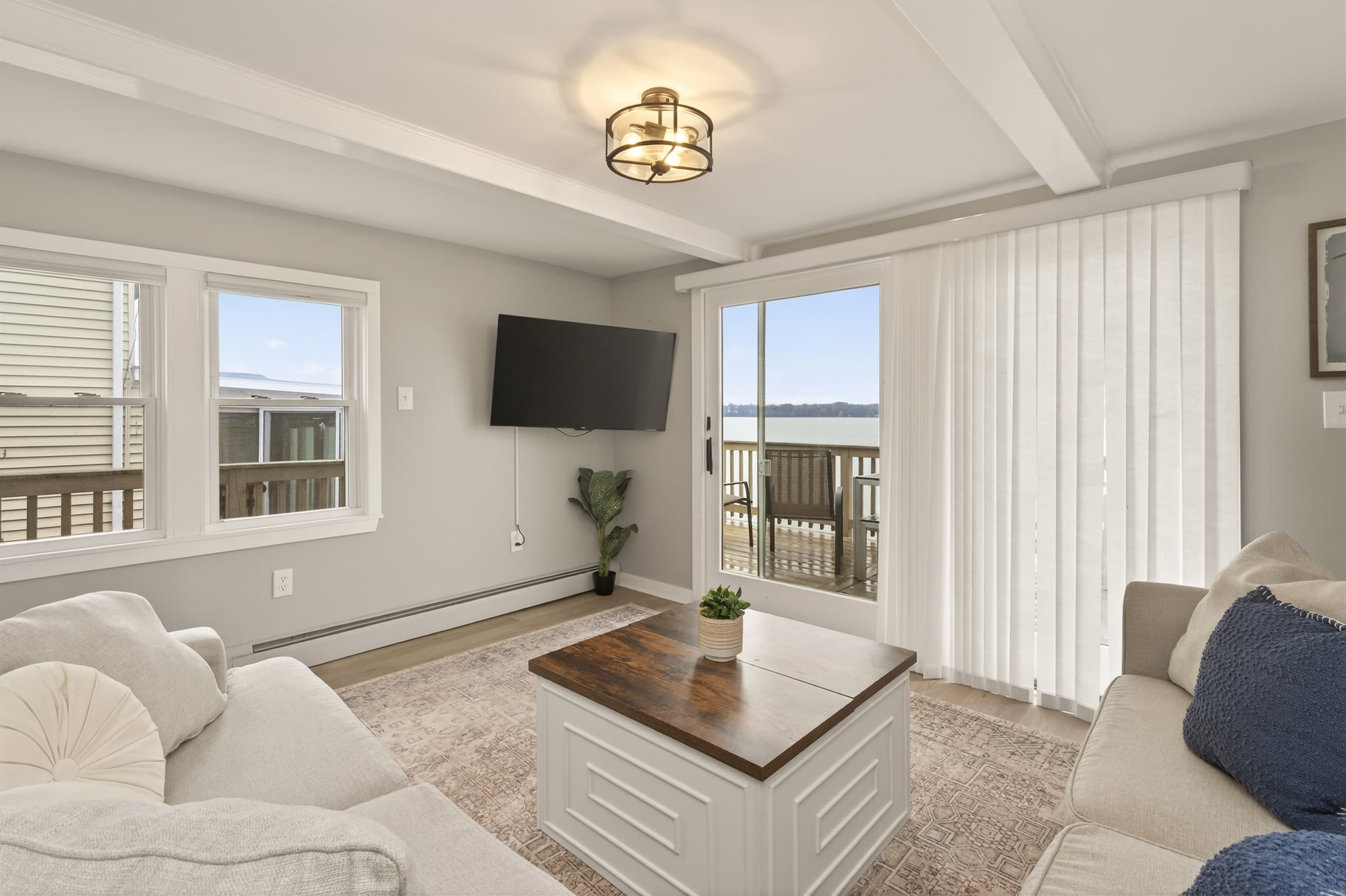 Living room with wall-mounted television