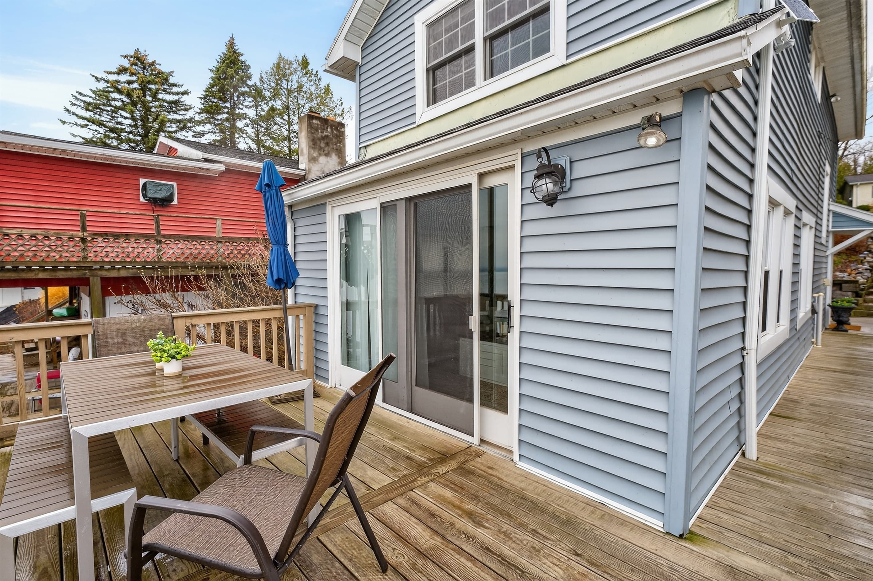 Side patio with table and chairs