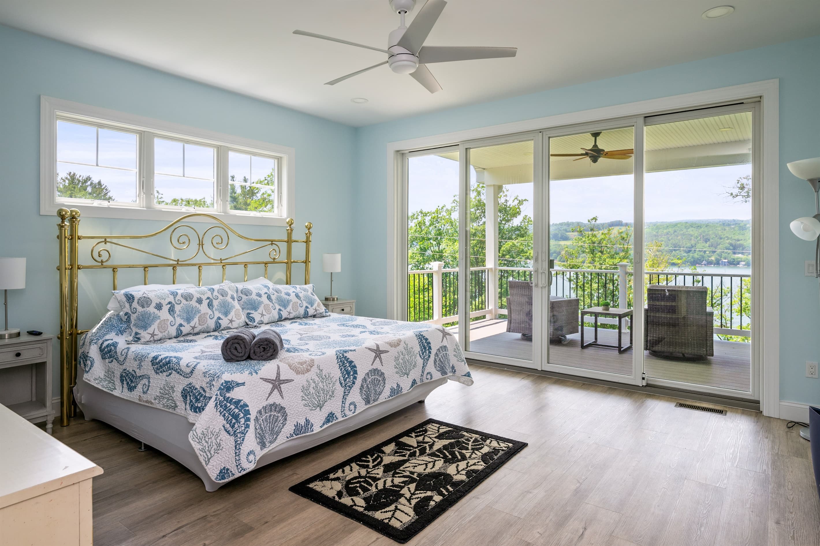 Bedroom with wide lake-facing balcony