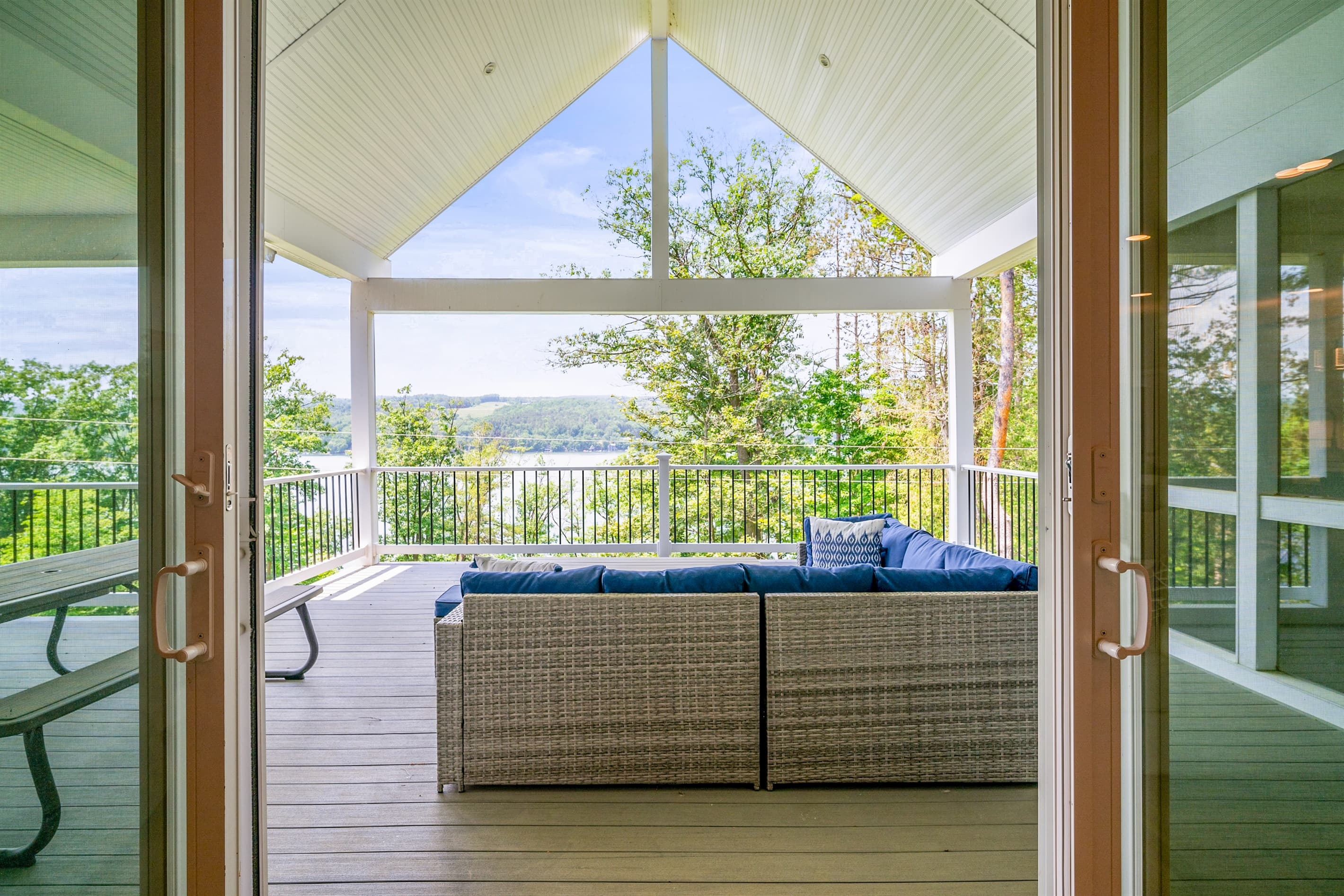 Screened porch overlooking the water