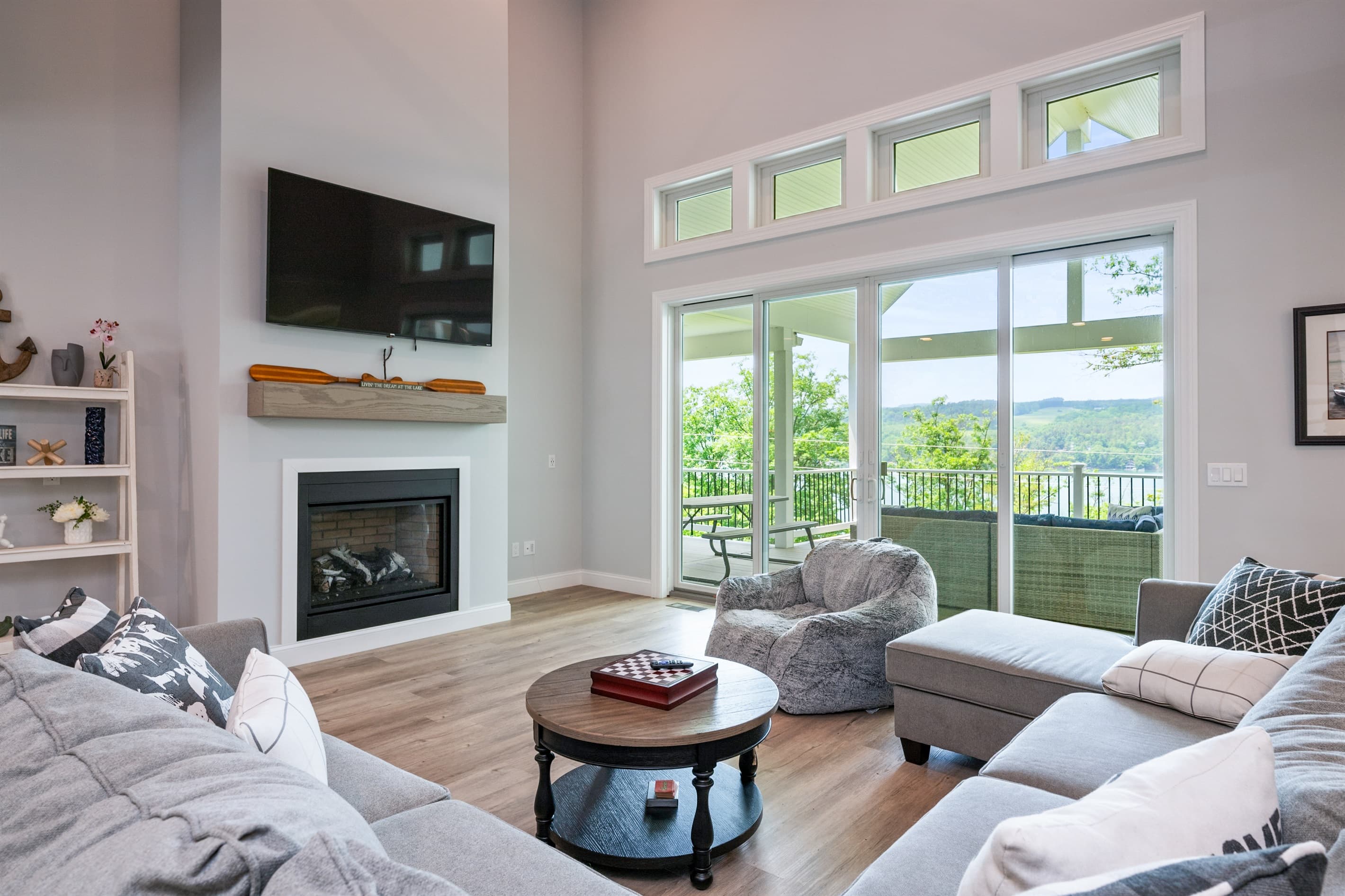 Living room with fireplace and mounted television