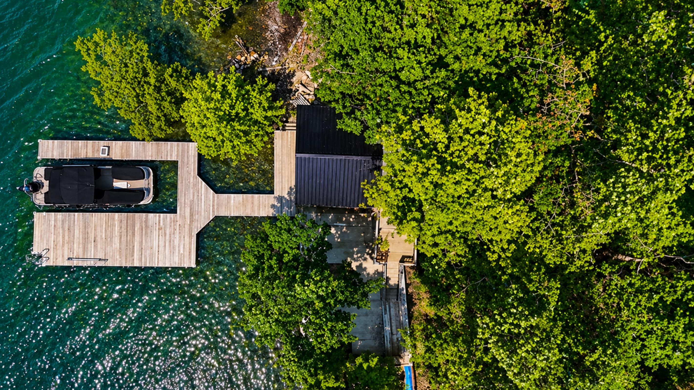 Overhead view of the home and shoreline