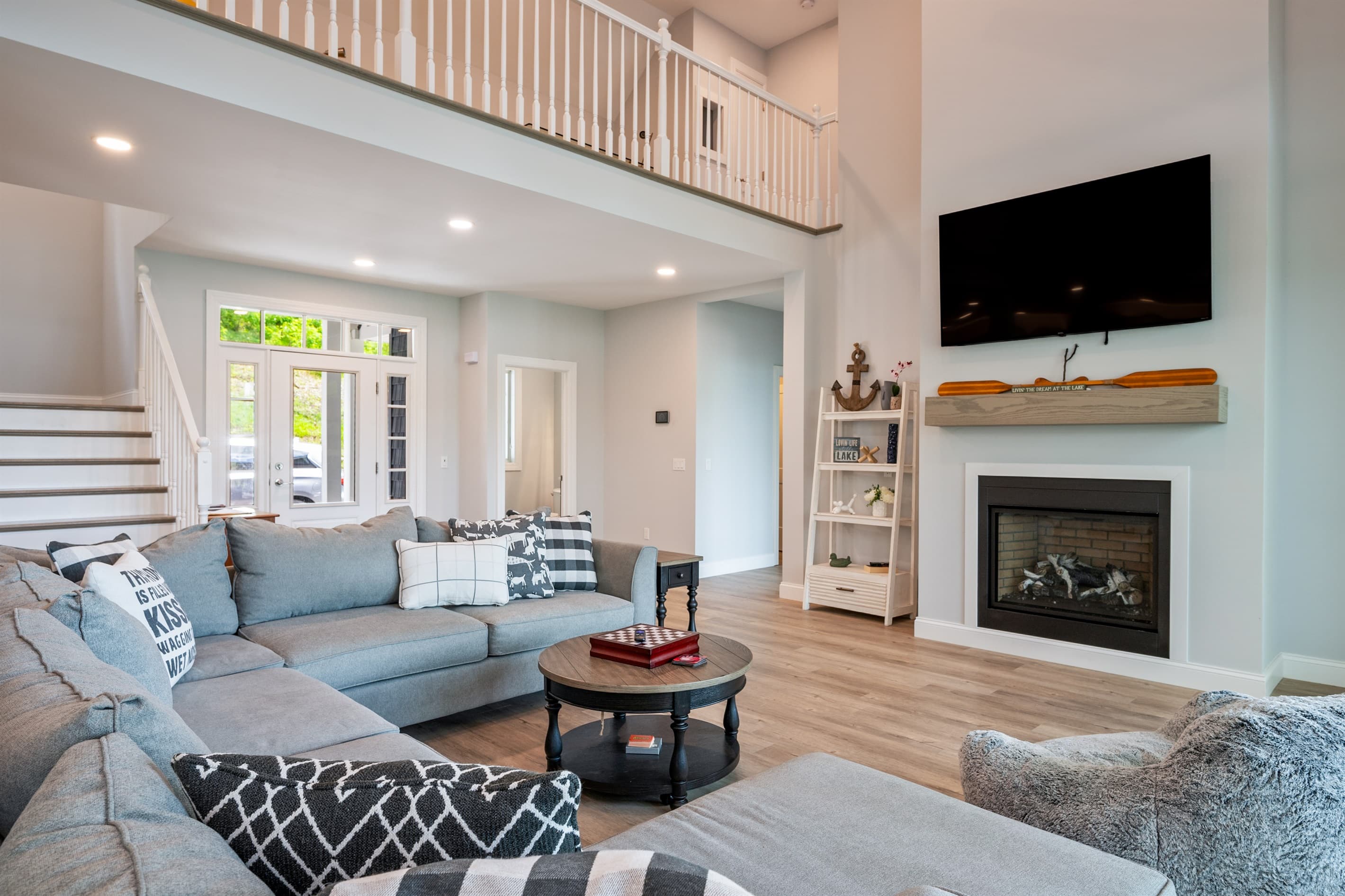 Living room with sectional and fireplace
