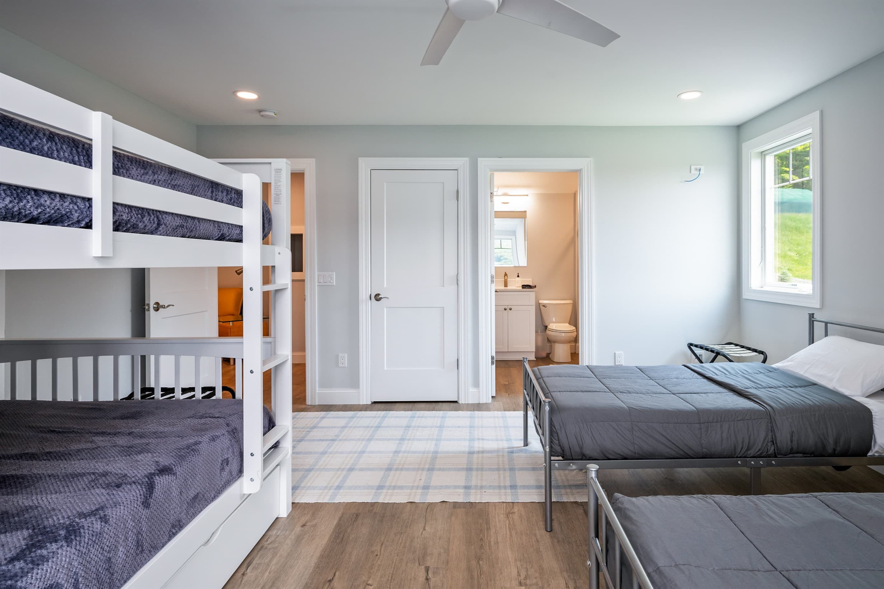 Bunk room with open floor space