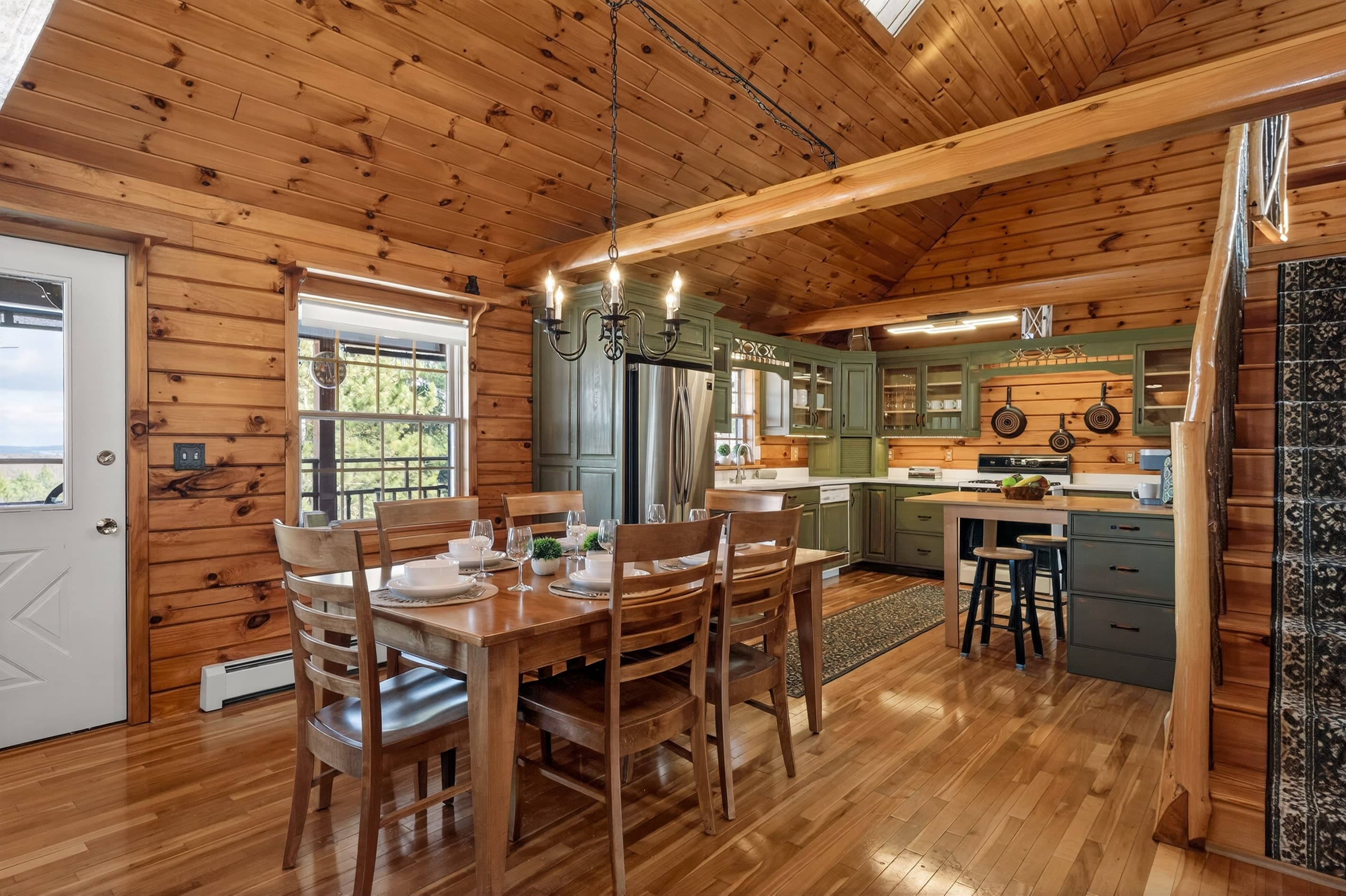 Dining table beside the open kitchen