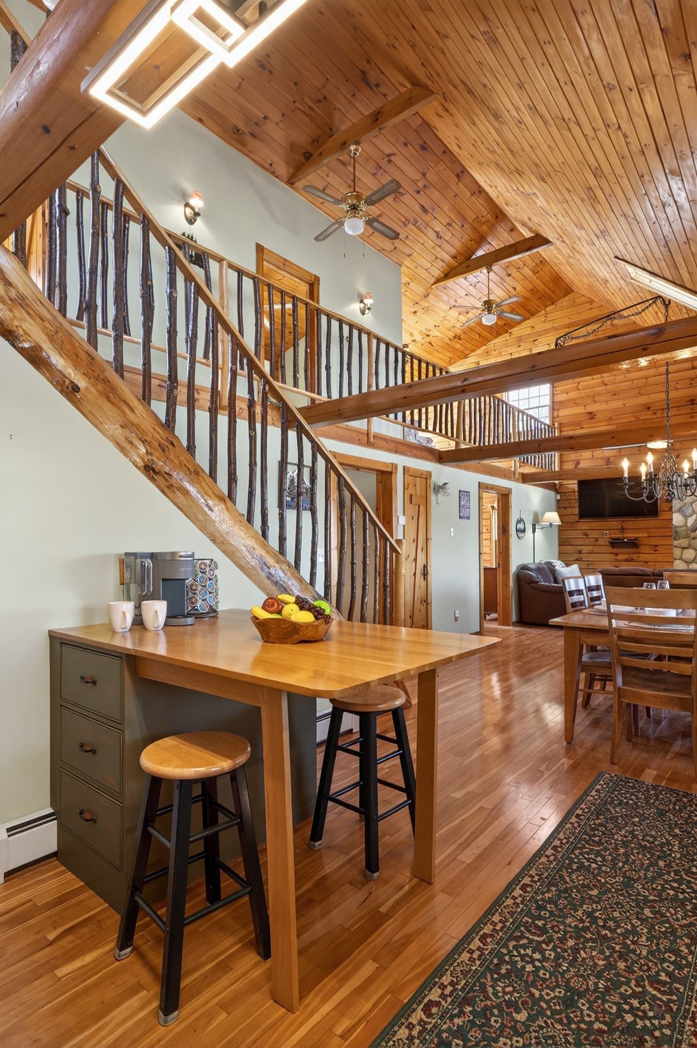 Kitchen island positioned beneath the staircase