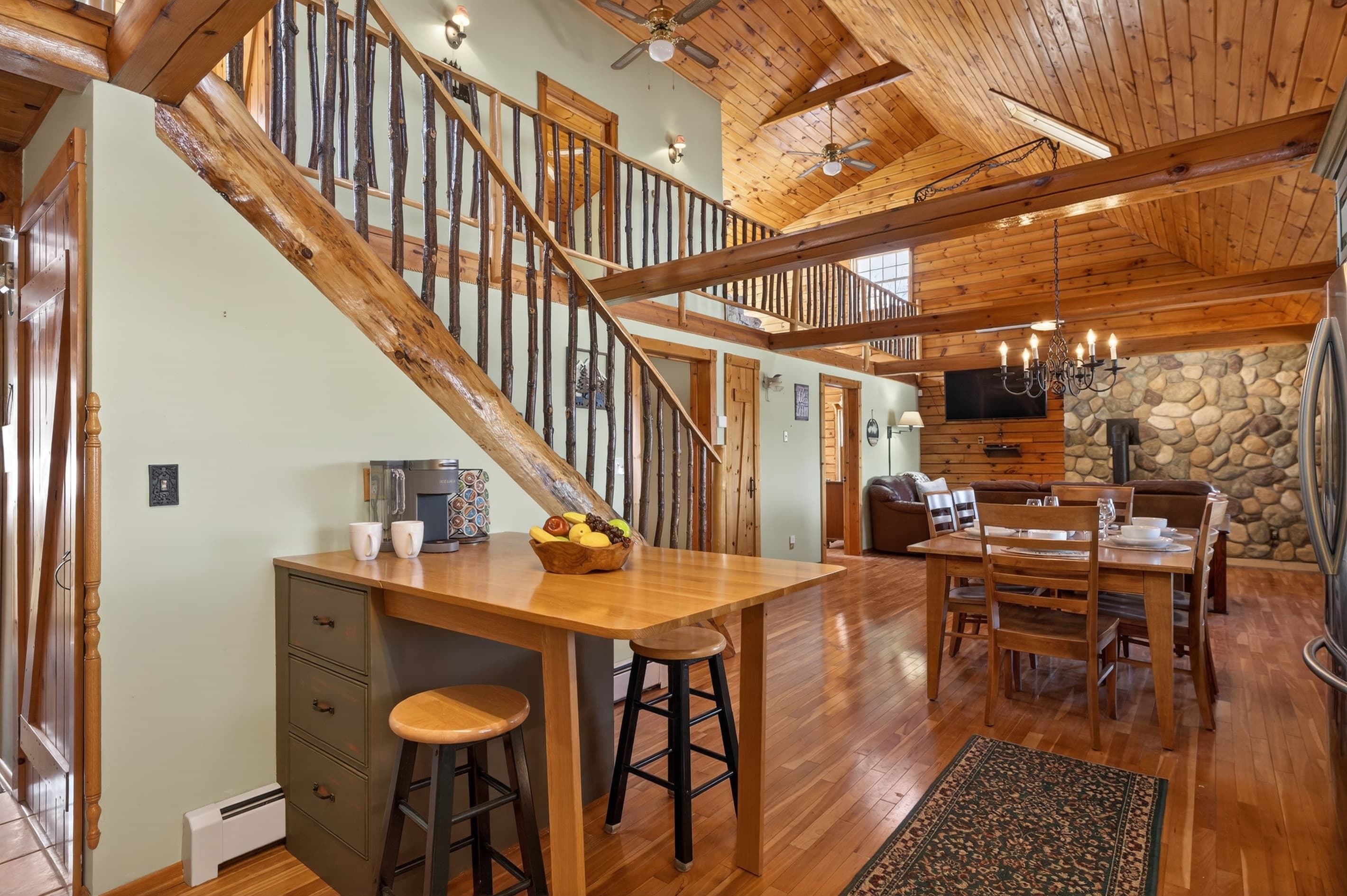 Kitchen range beside the wooden staircase