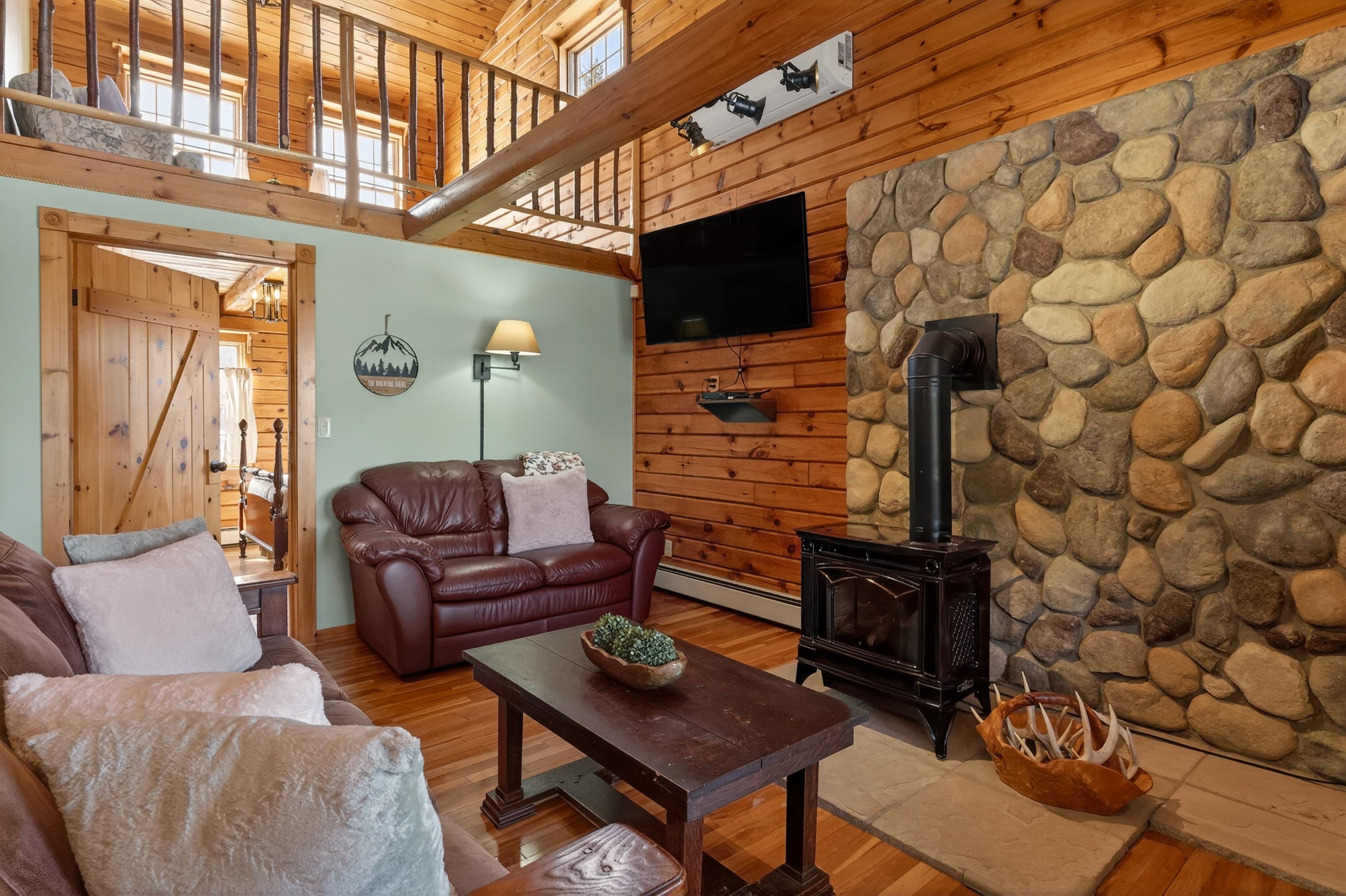 Seating area beside the stone wall