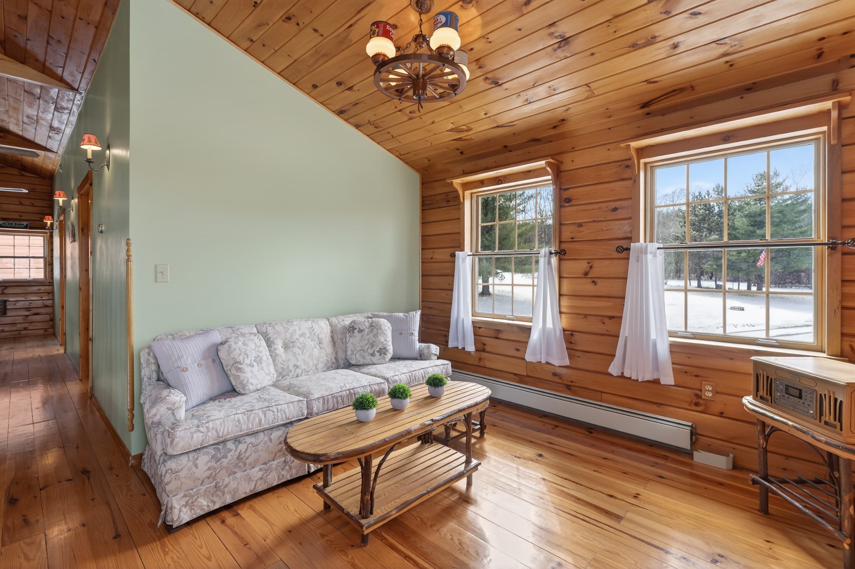 Upper lounge with sofa and window seating