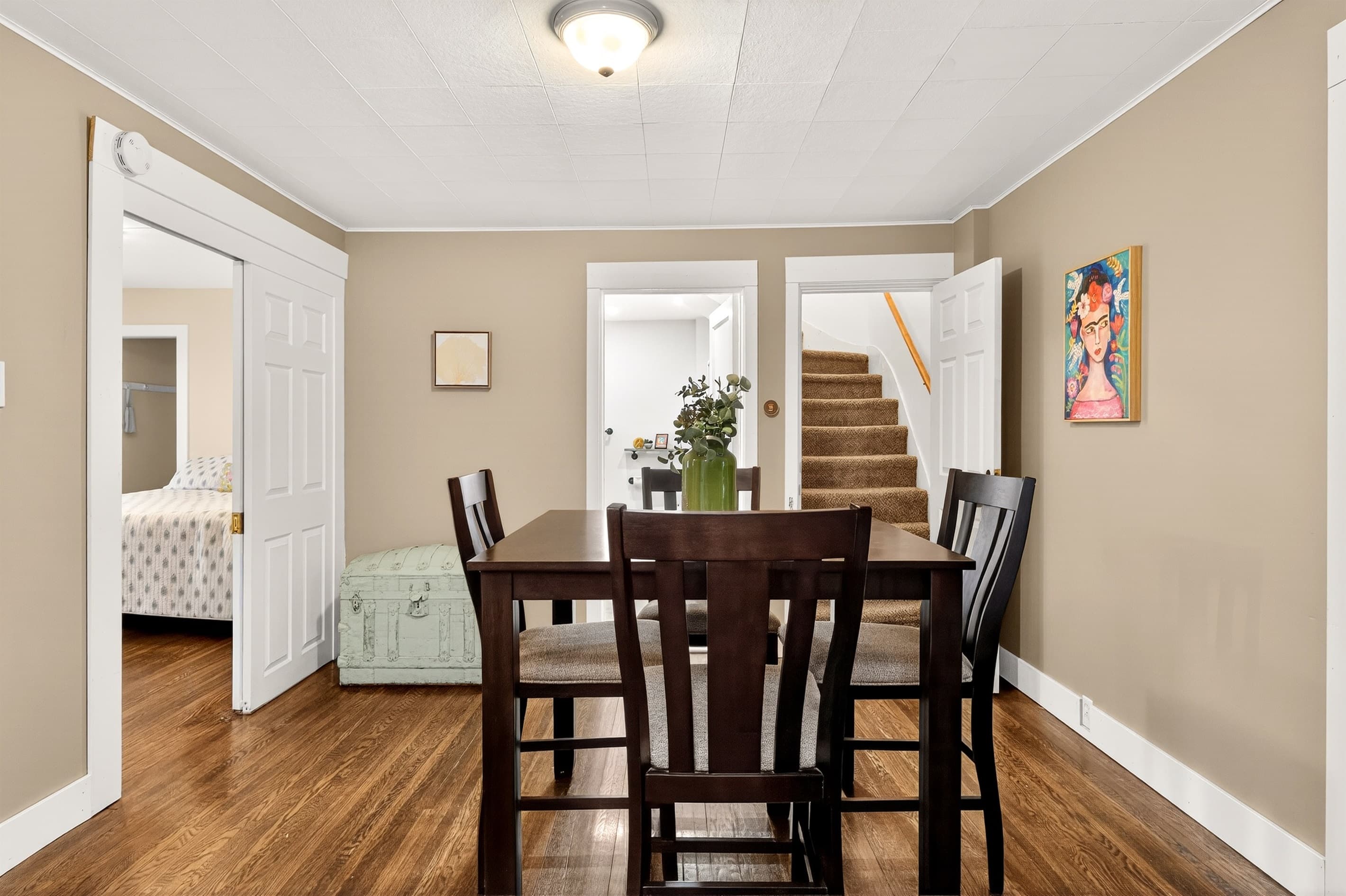 Additional seating or game table leading to the main floor full bathroom , Queen bedroom or upstairs - main floor
