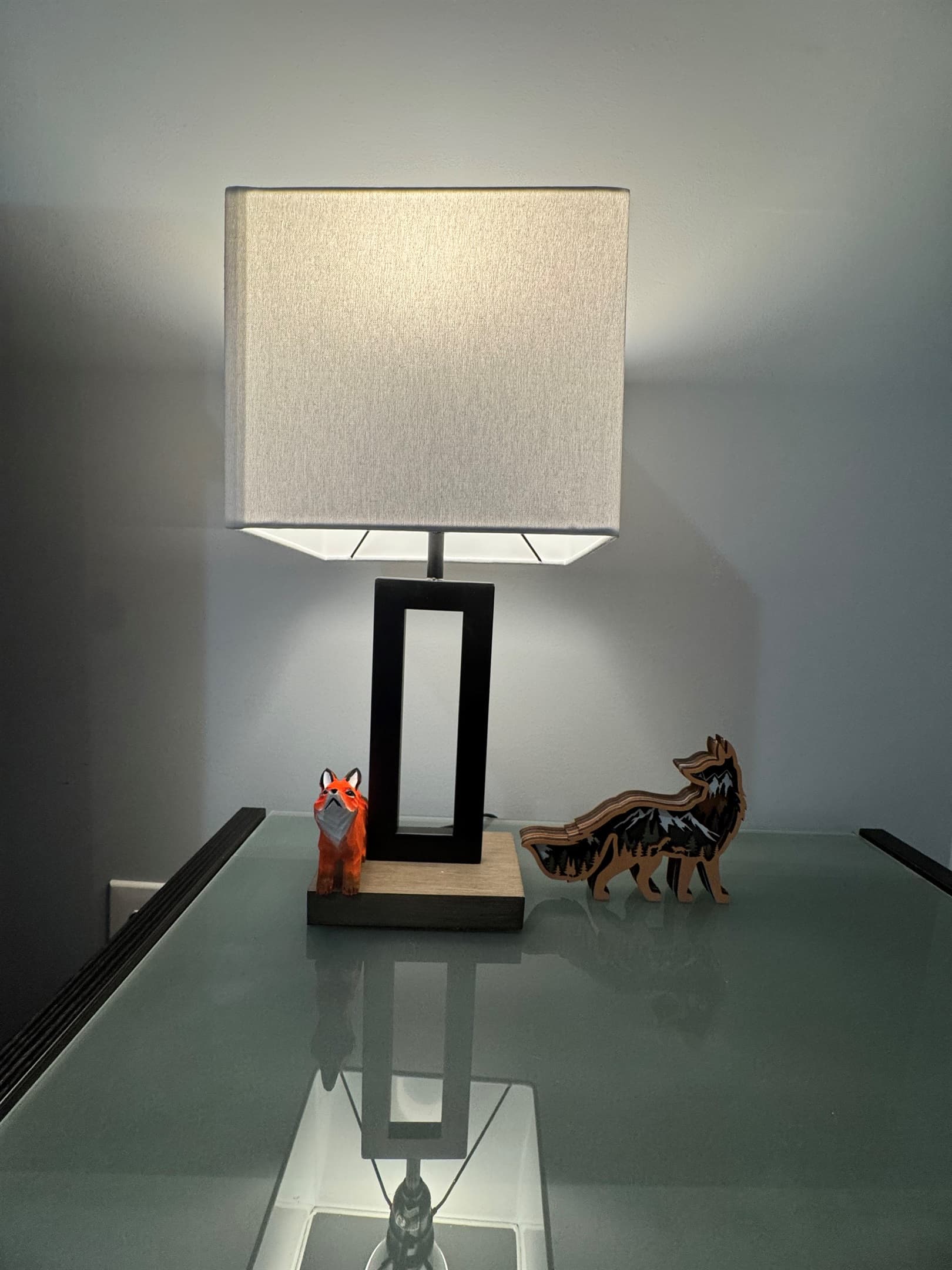 Table lamp against a gray wall