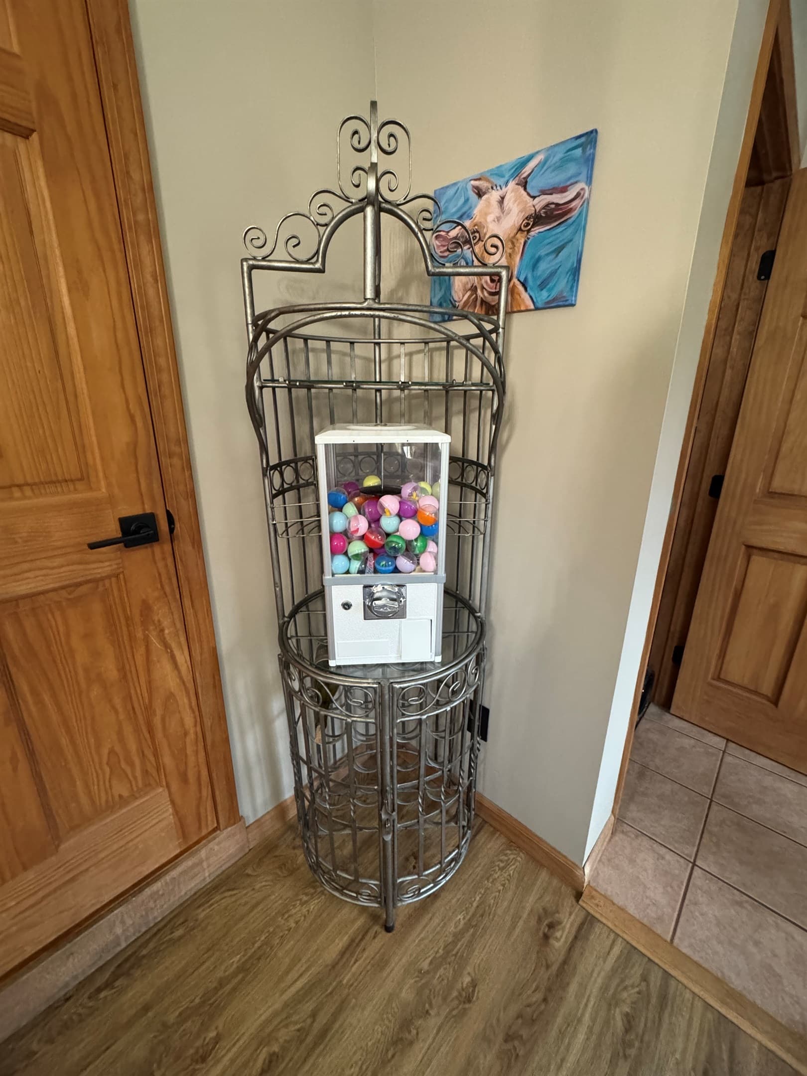 Candy dispenser in decorative metal stand