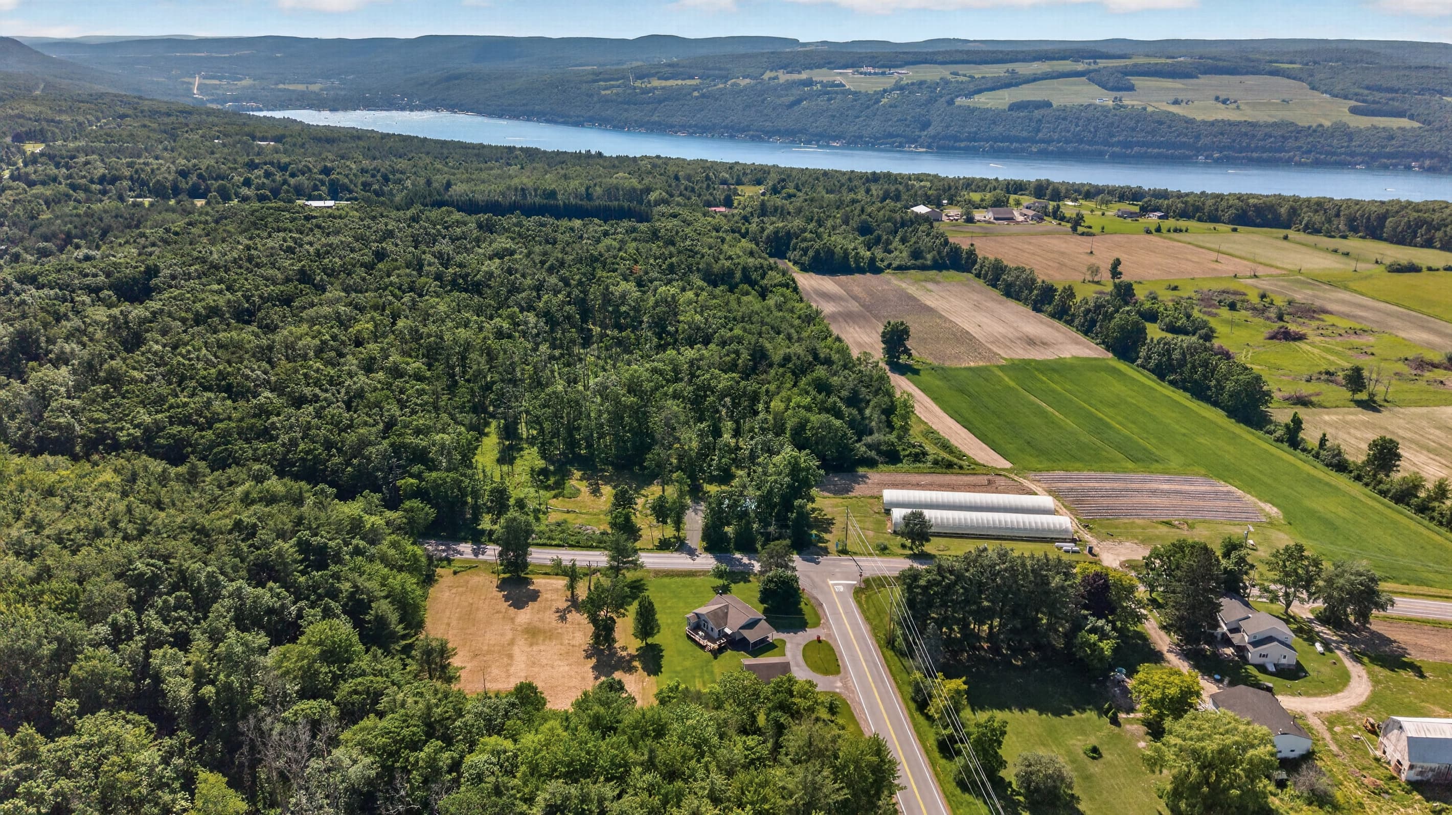 Fields and roads extending toward the lake