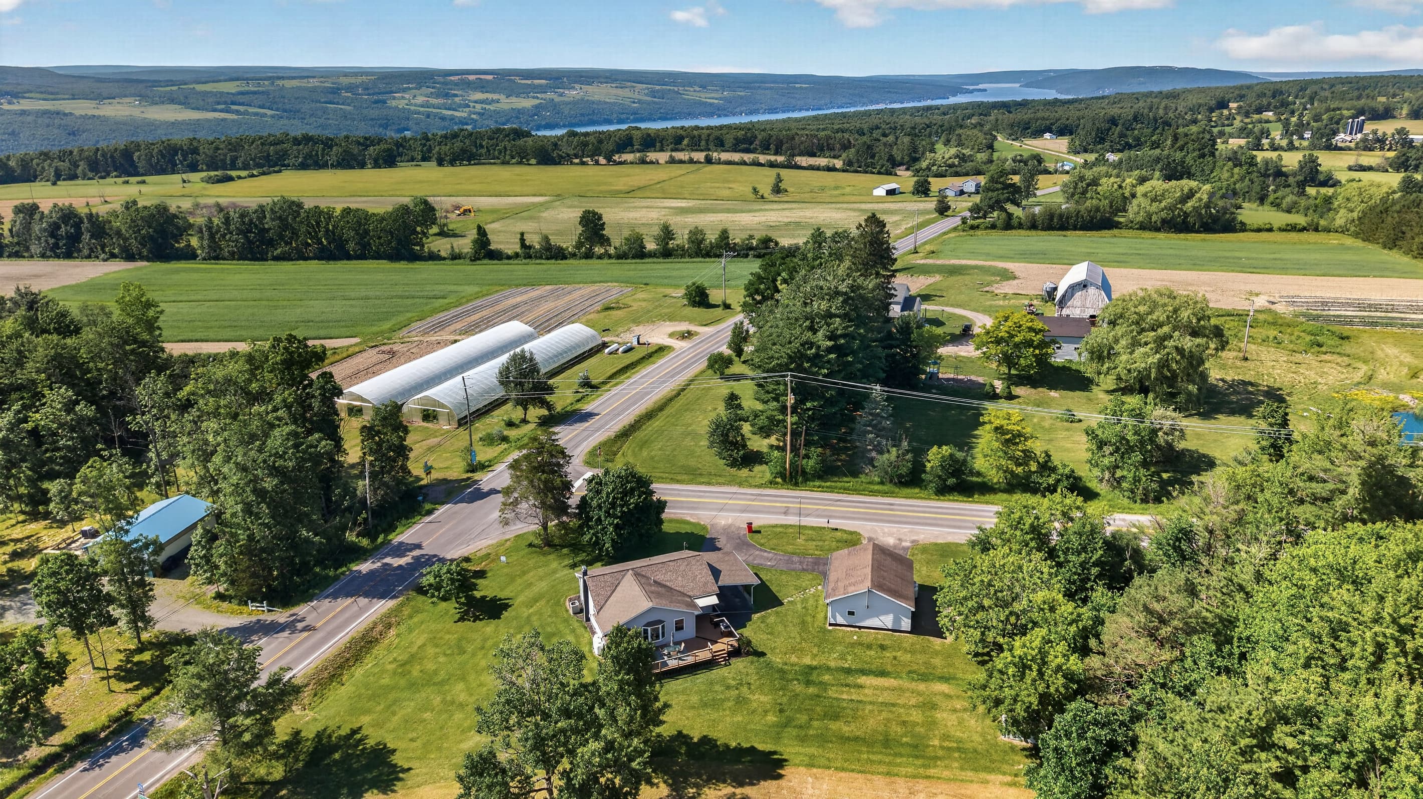 Home and nearby farms viewed from above