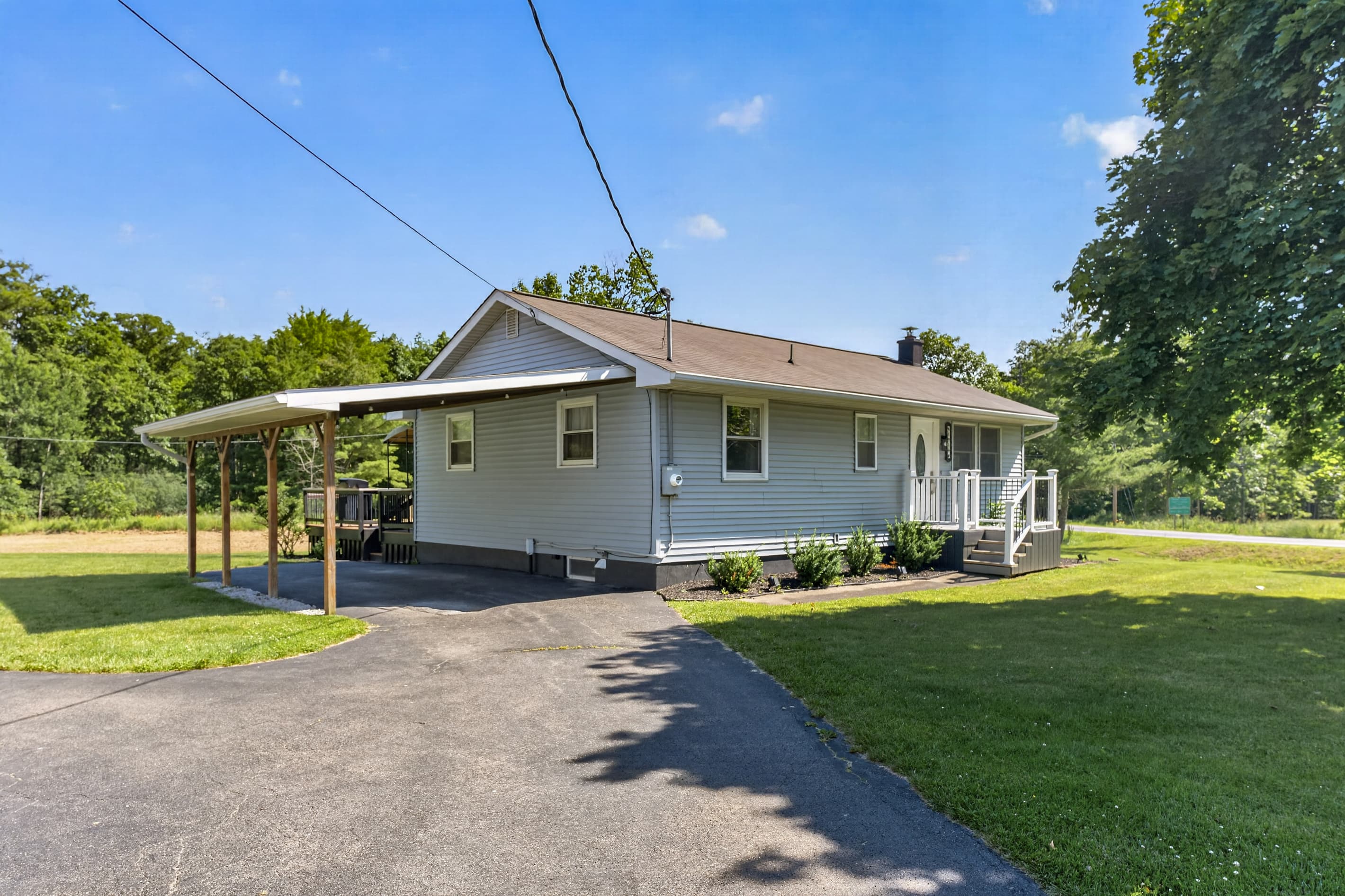 Driveway beside the covered carport