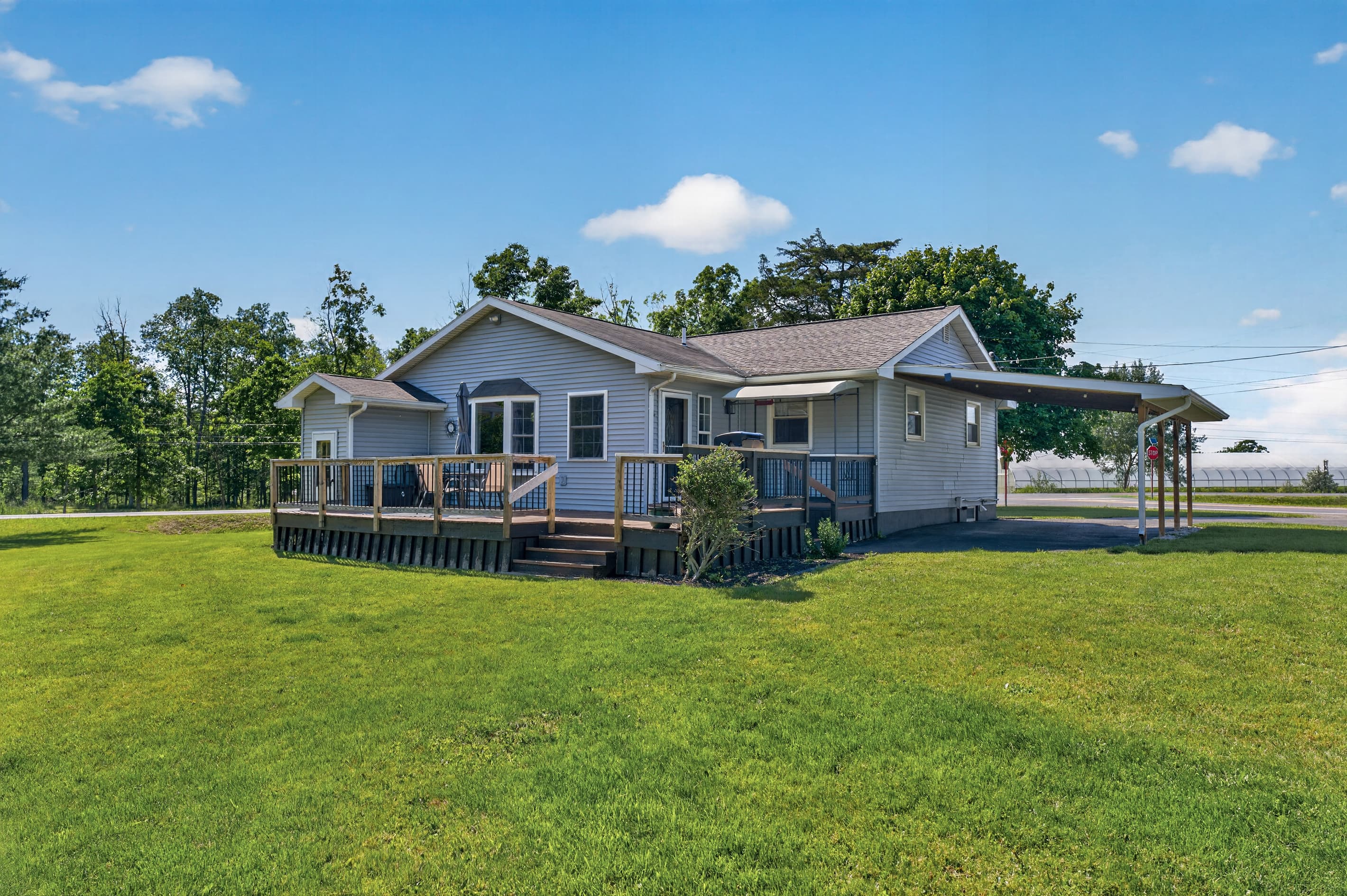 Rear deck facing the open lawn