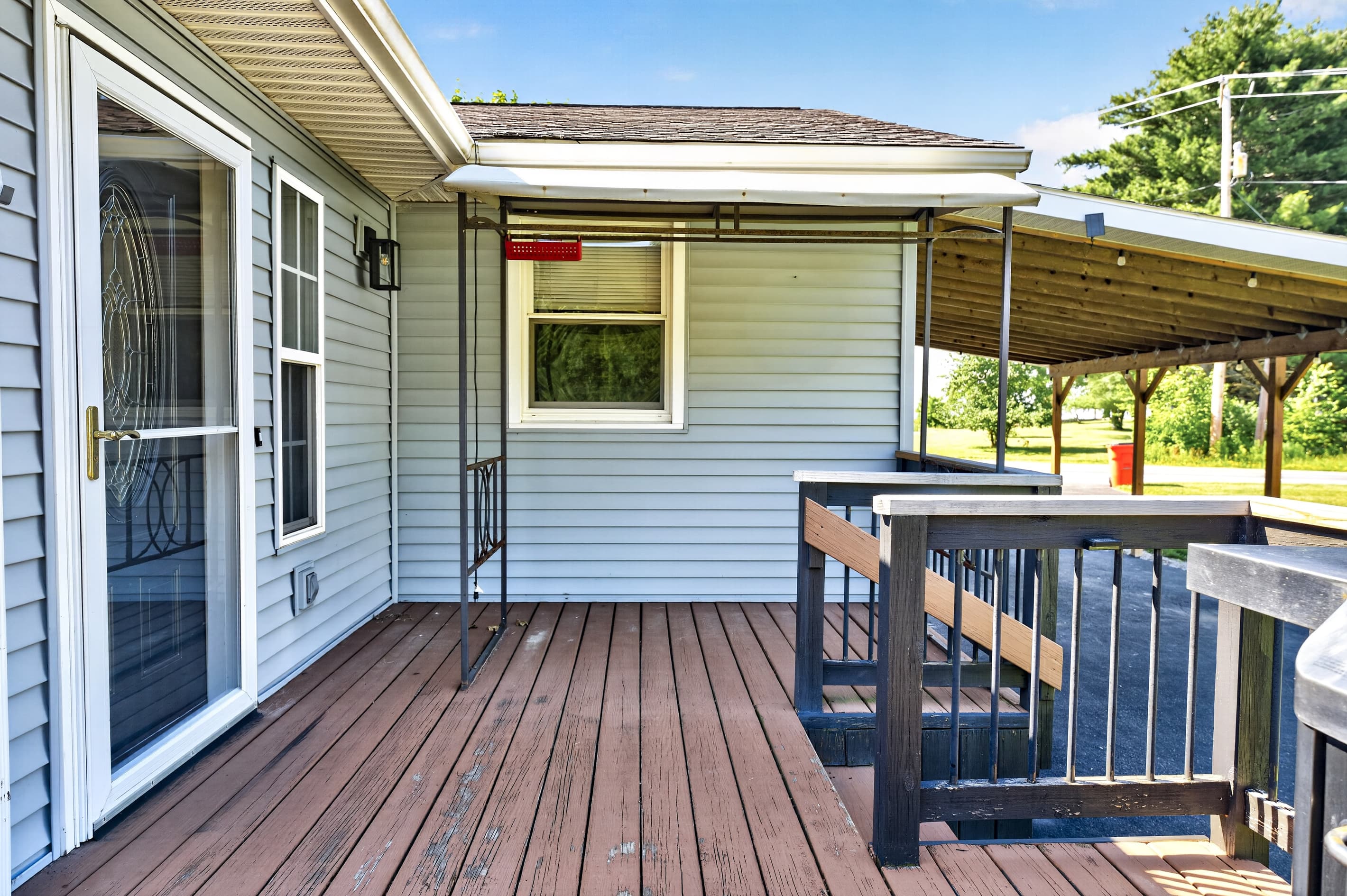 Covered deck beside the exterior door