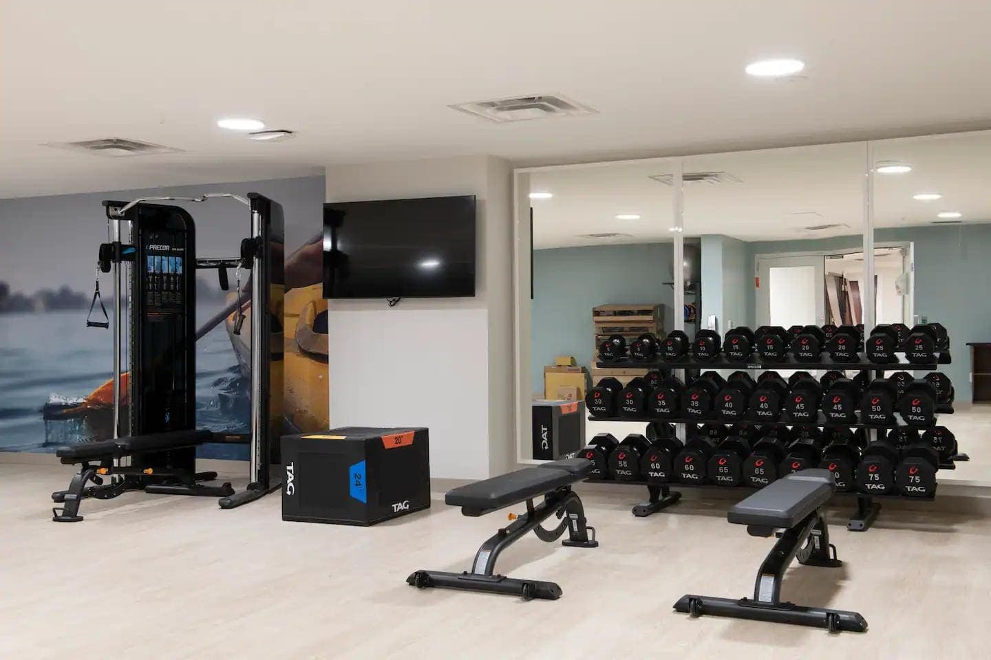 Fitness room with cardio and weight equipment