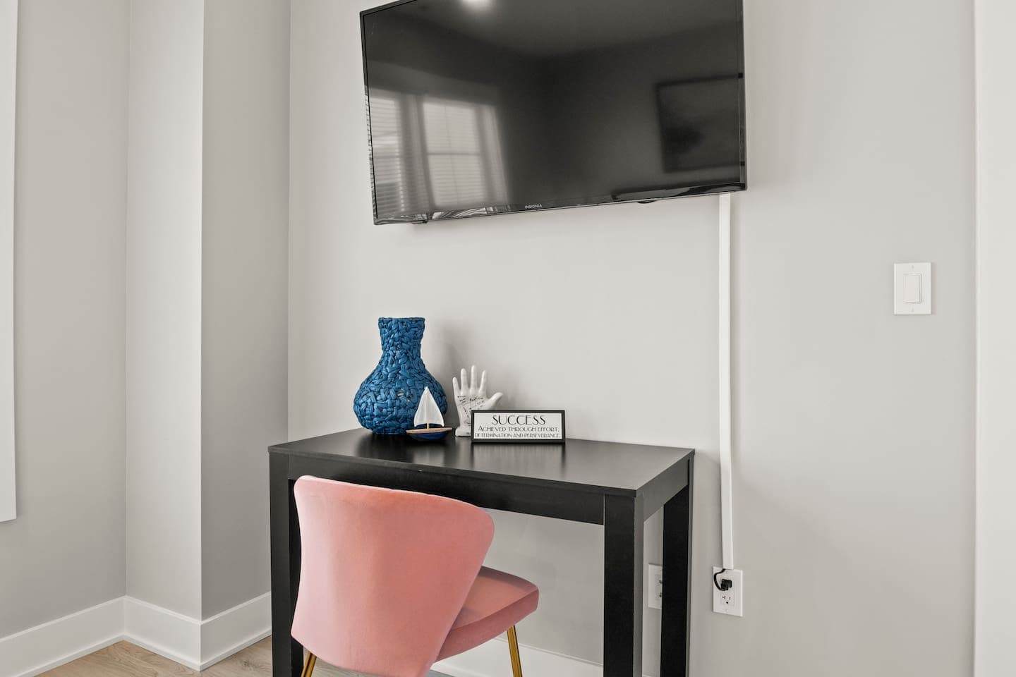 Dedicated workspace with desk and television