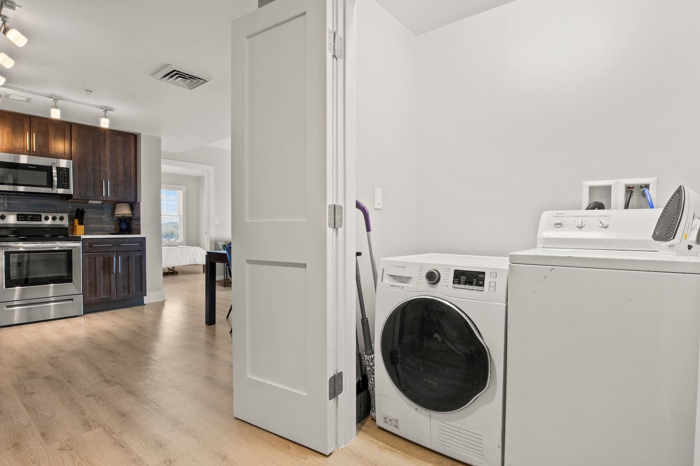 Laundry closet with washer and dryer