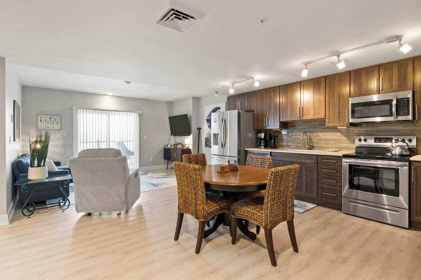 Open-plan kitchen, dining, and living area