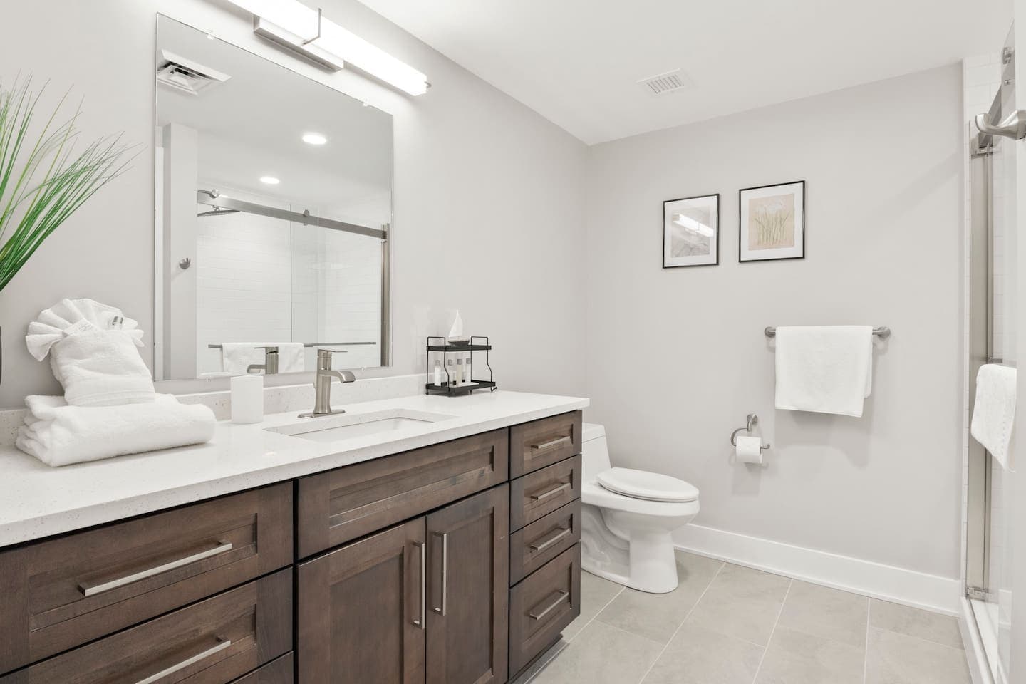 Bathroom with double vanity and large mirror