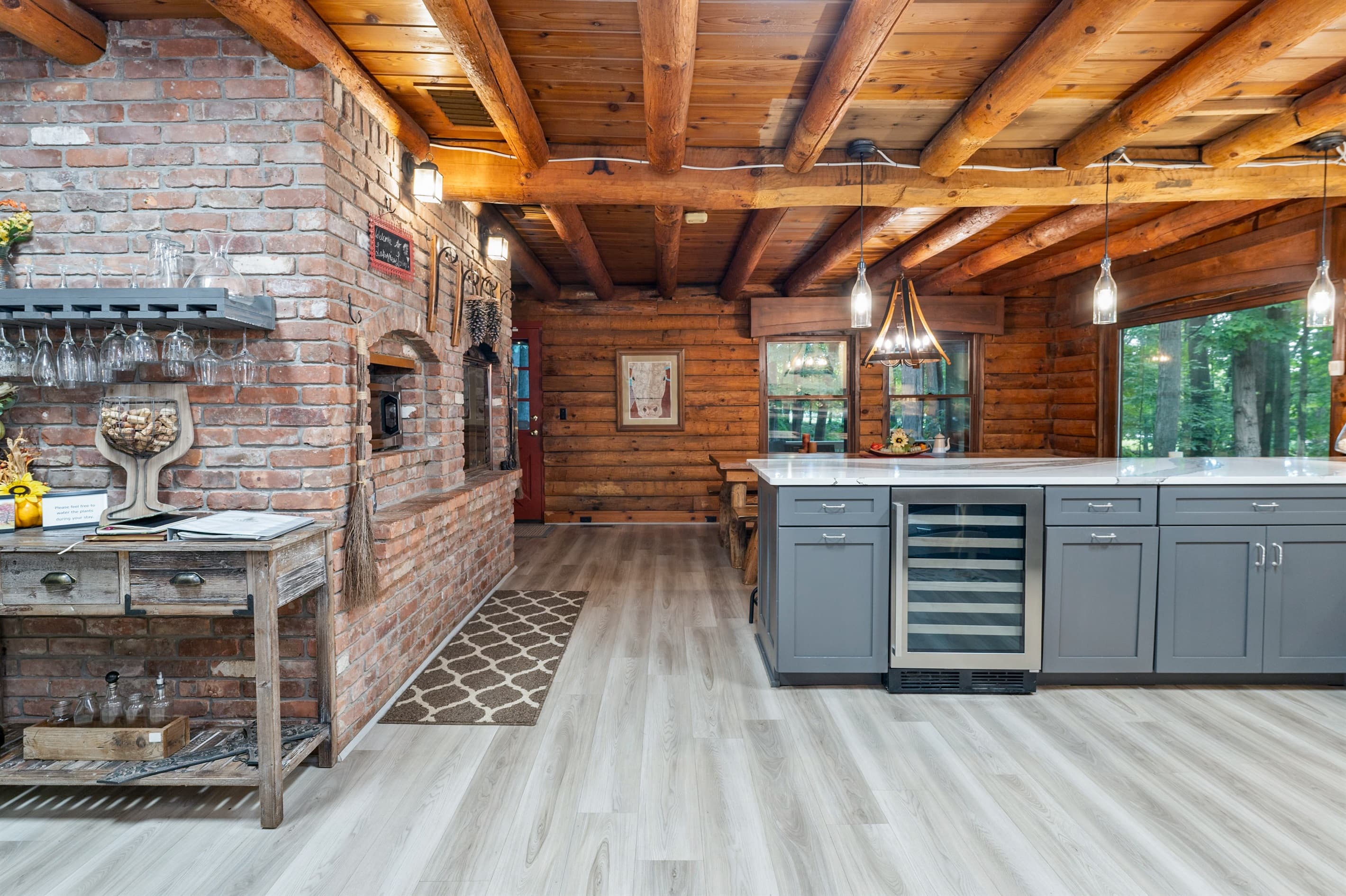 Log cabin kitchen with brick accents