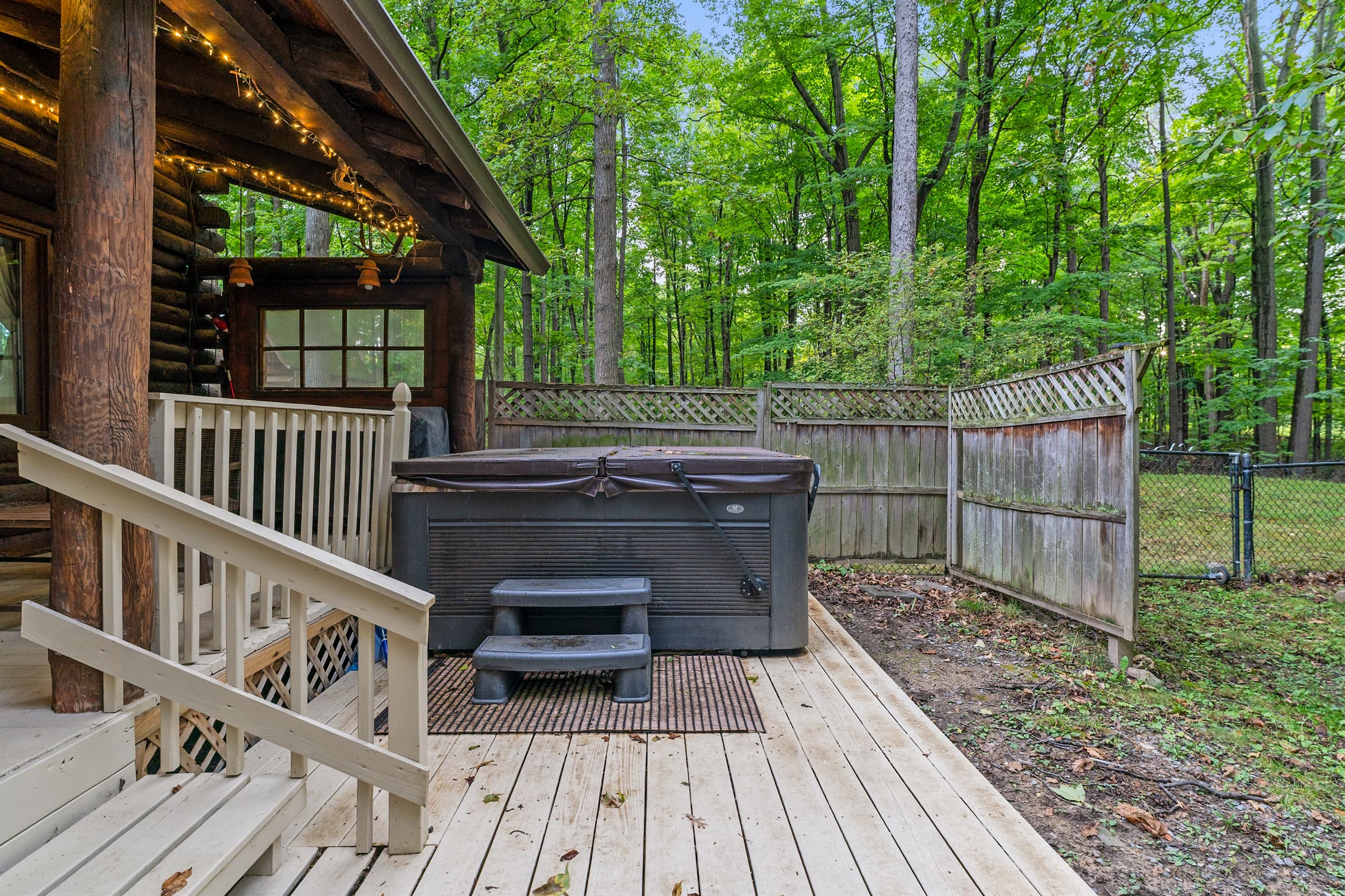 Private hot tub on the wooded deck