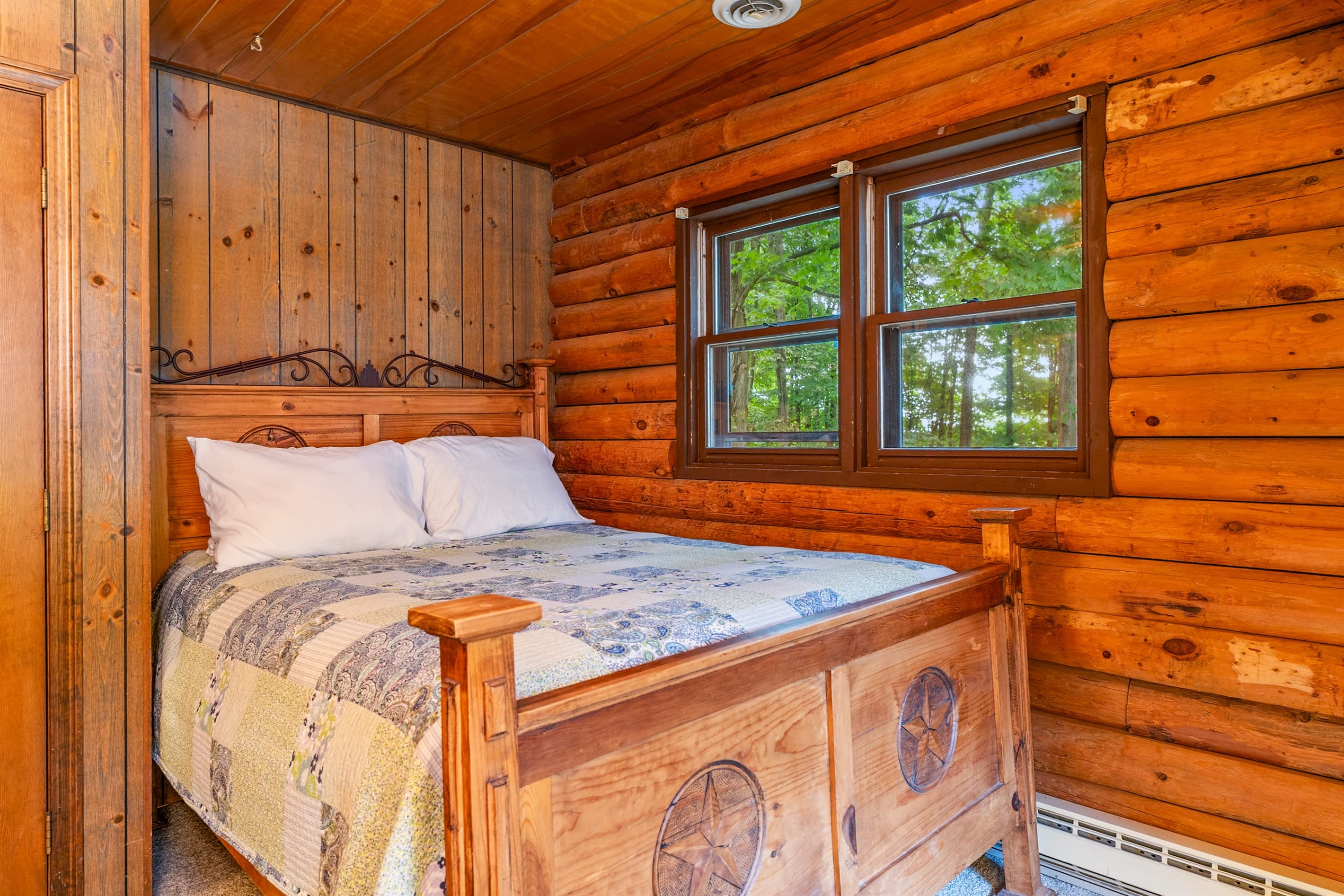 Guest bedroom with natural wood finishes