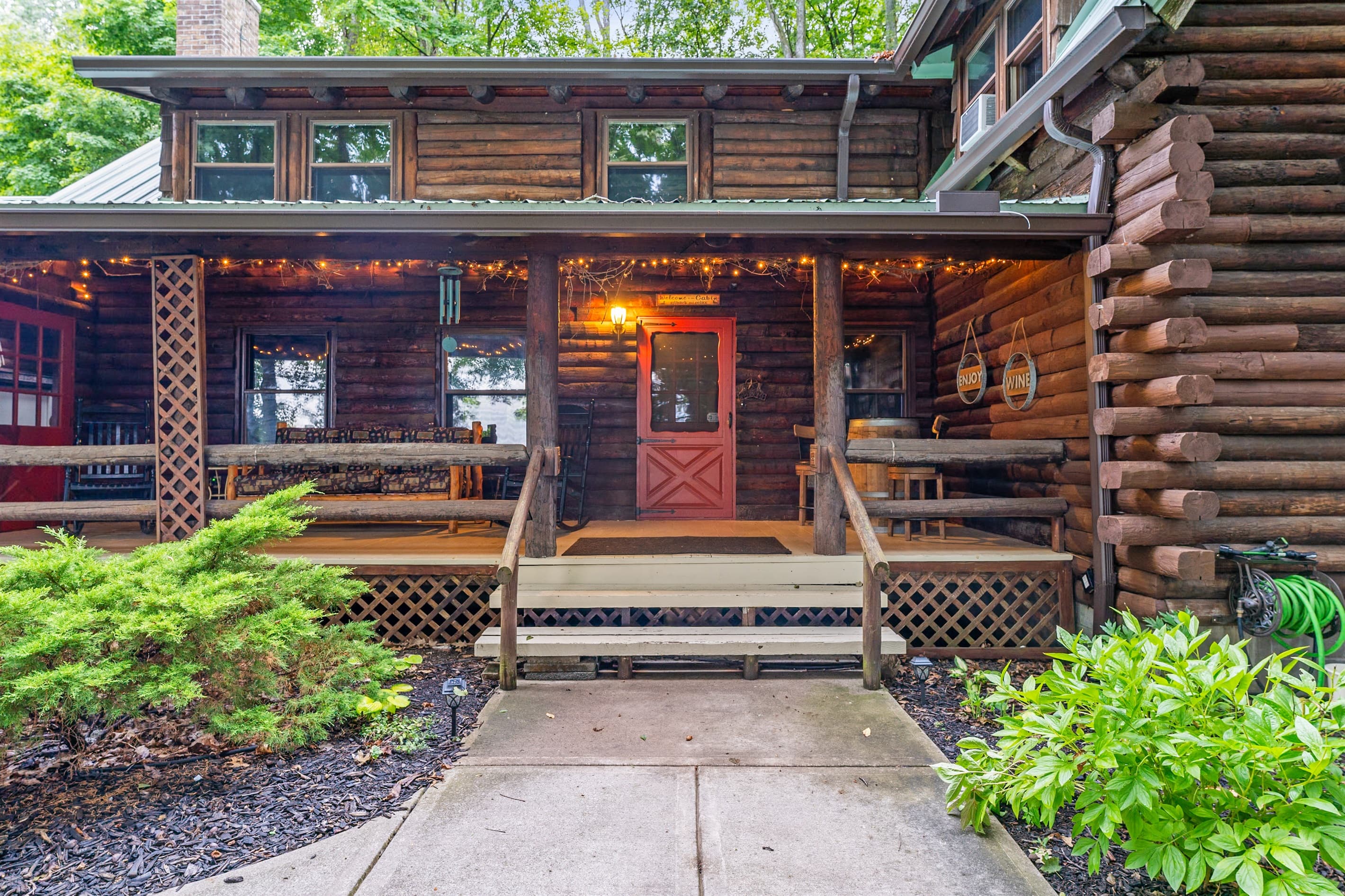 Front entrance with elevated porch and steps