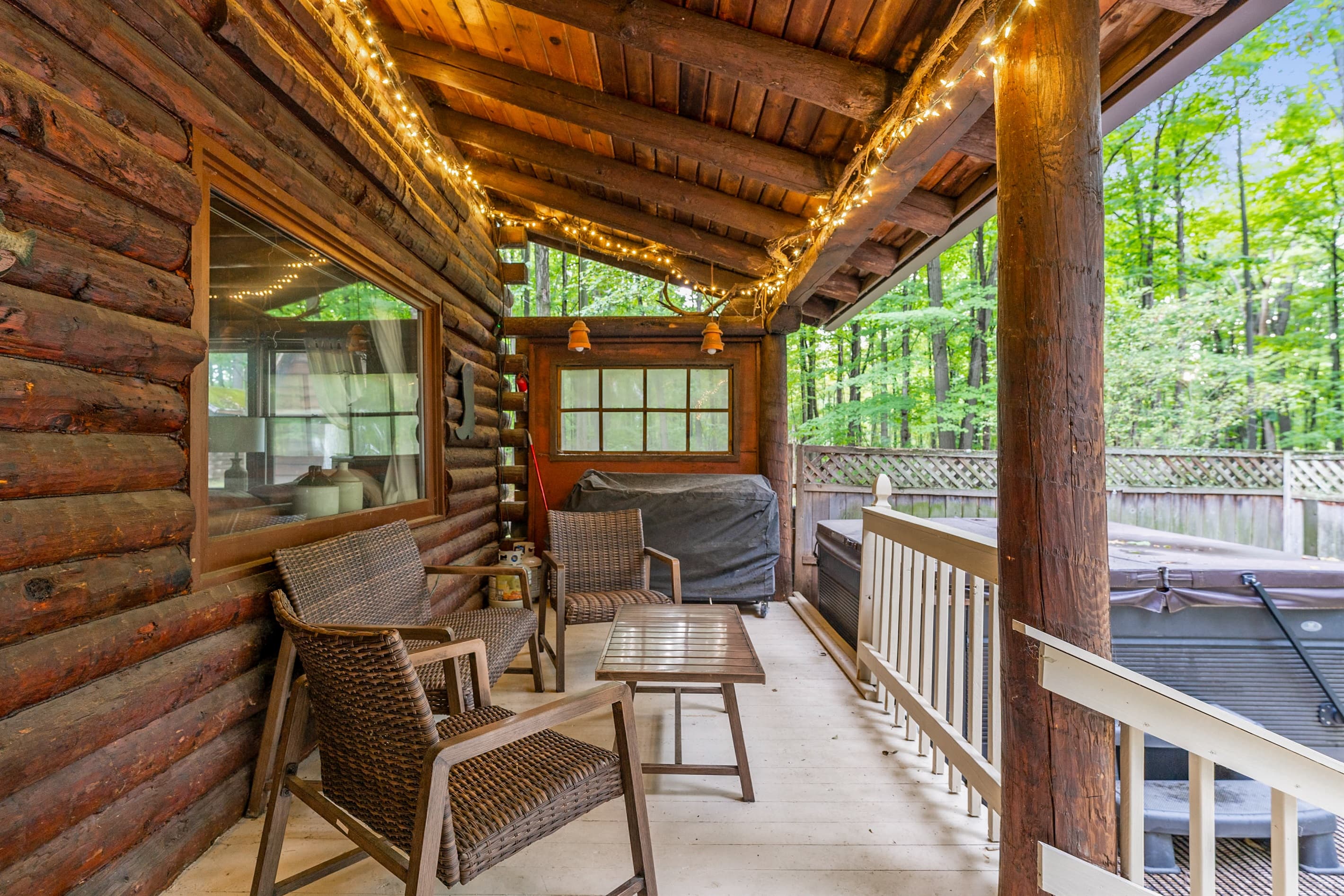 Covered porch with outdoor lounge furniture