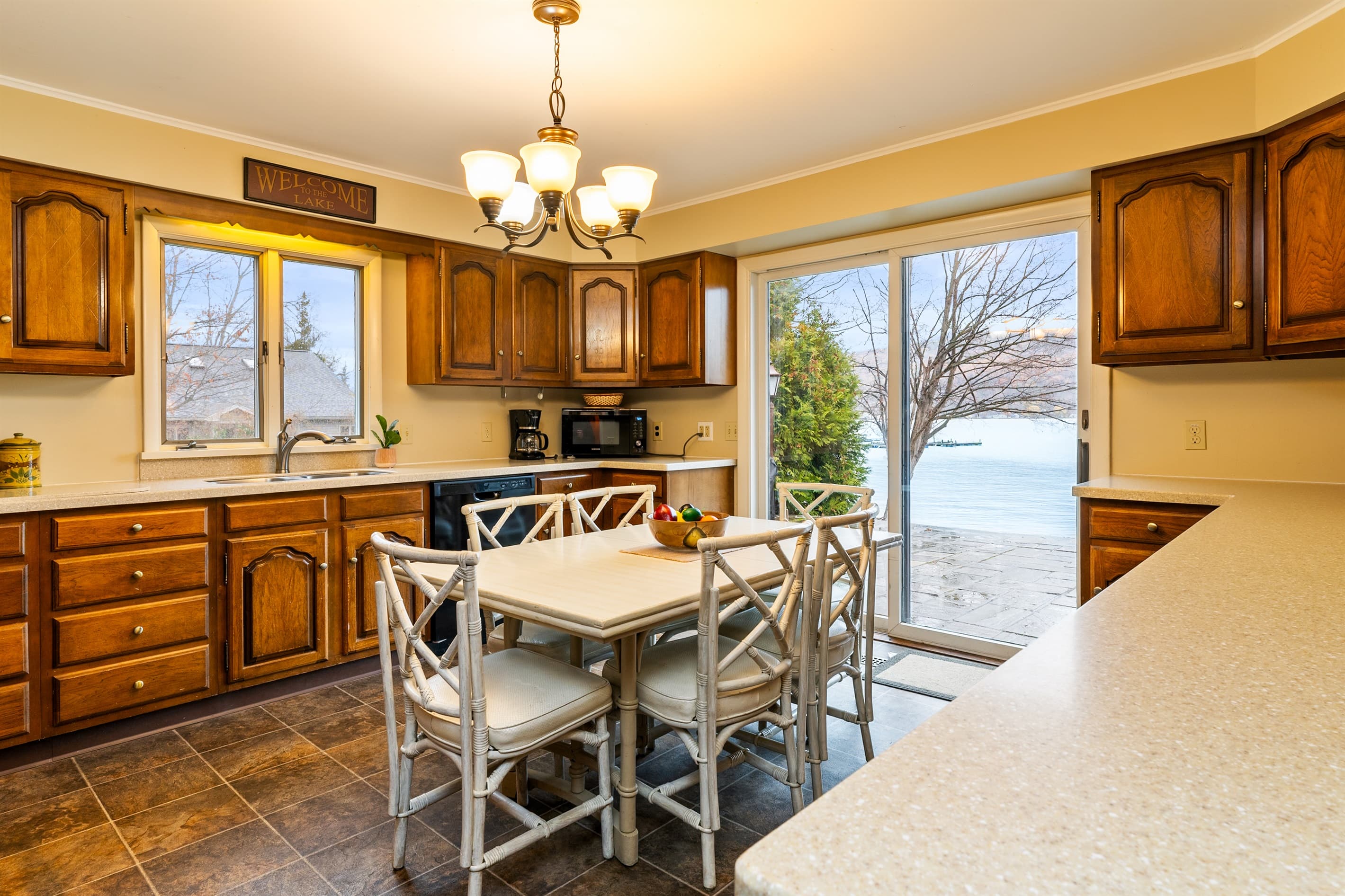 White dining table in the middle of the kitchen workspace