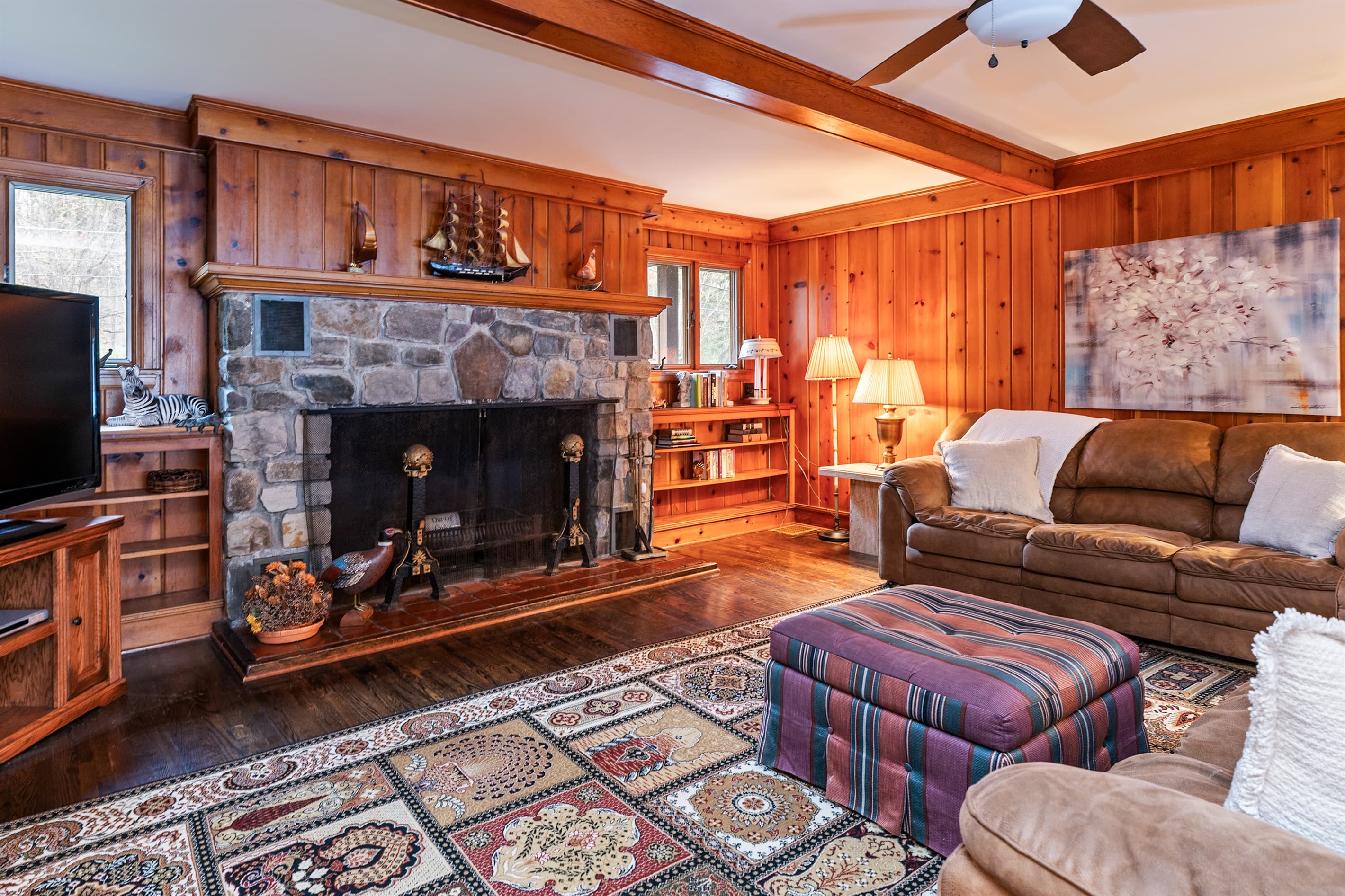 Living room fireplace with stone surround