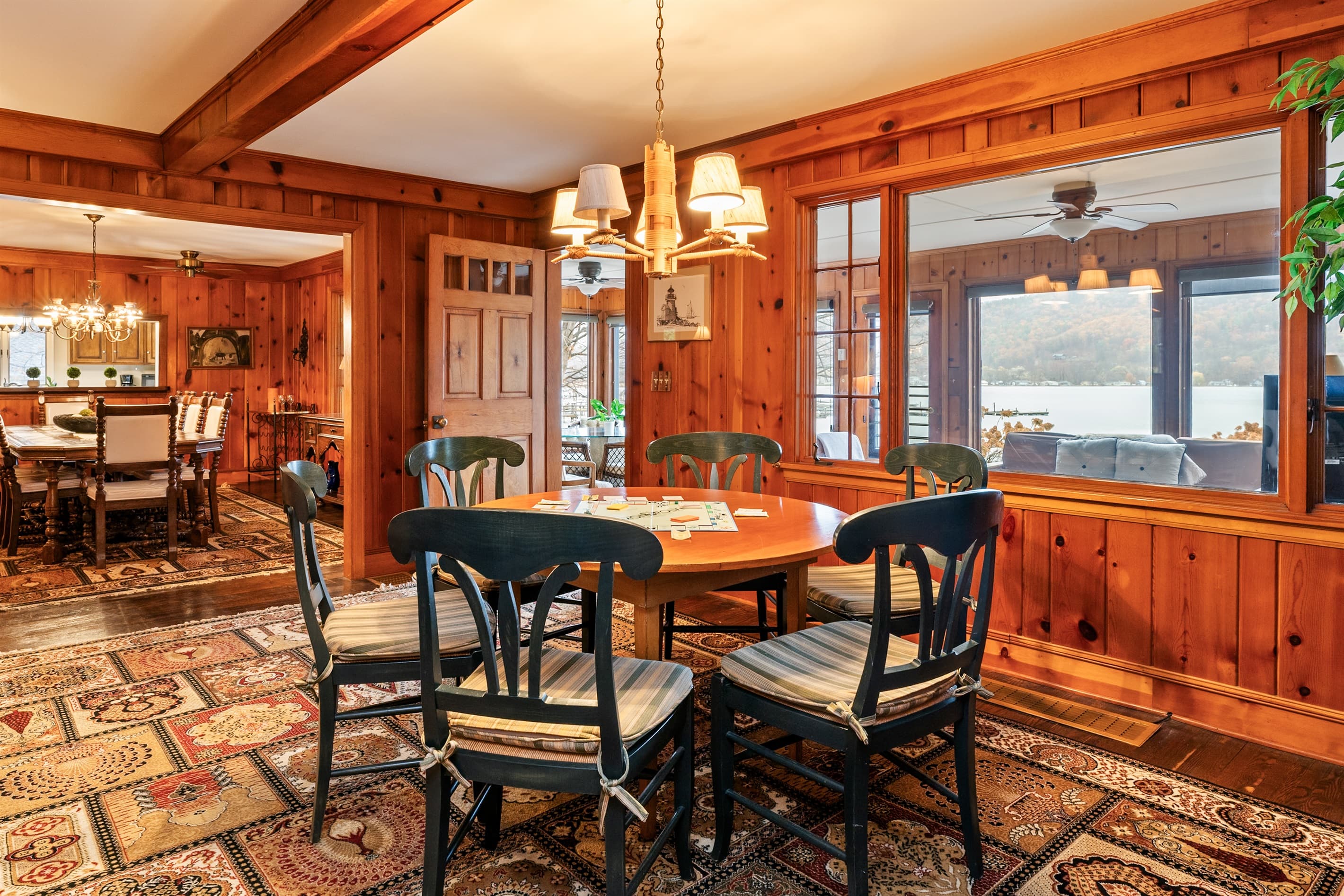 Dining area surrounded by warm wood finishes