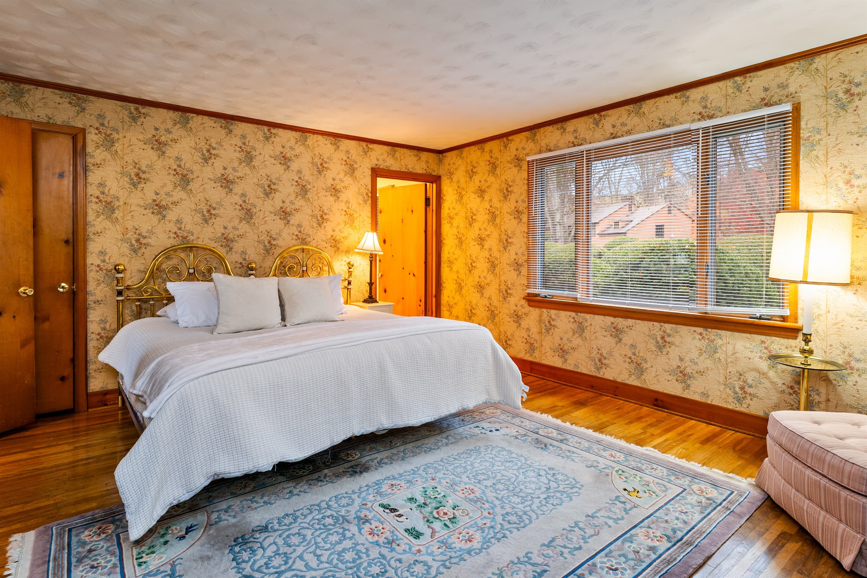 Main-floor bedroom with large window