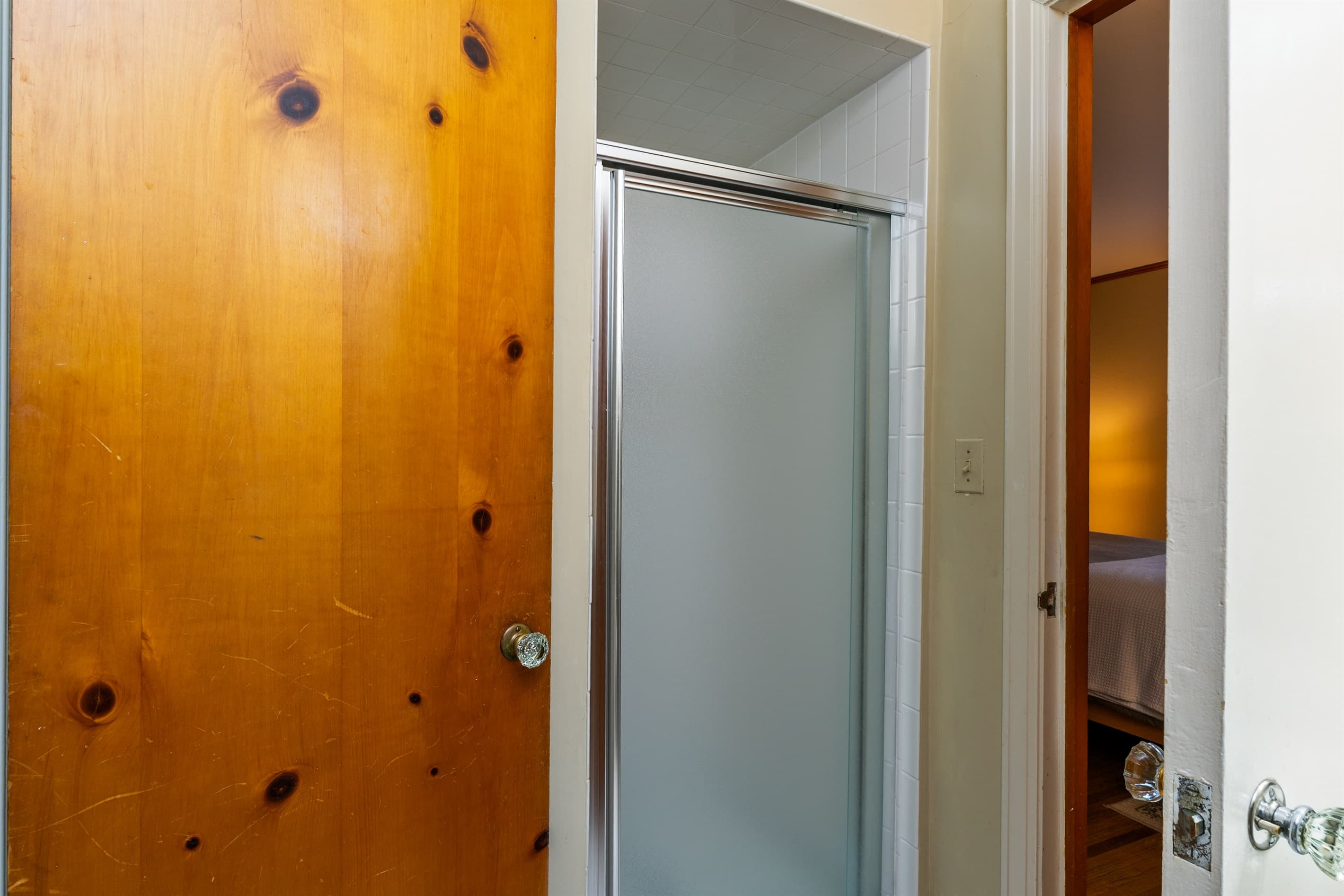 Bathroom with glass enclosed shower