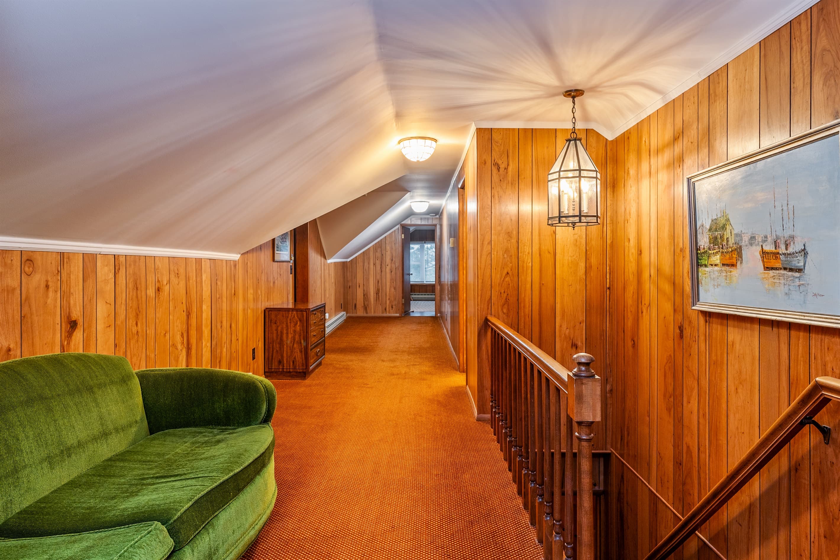 Upstairs landing with seating and artwork
